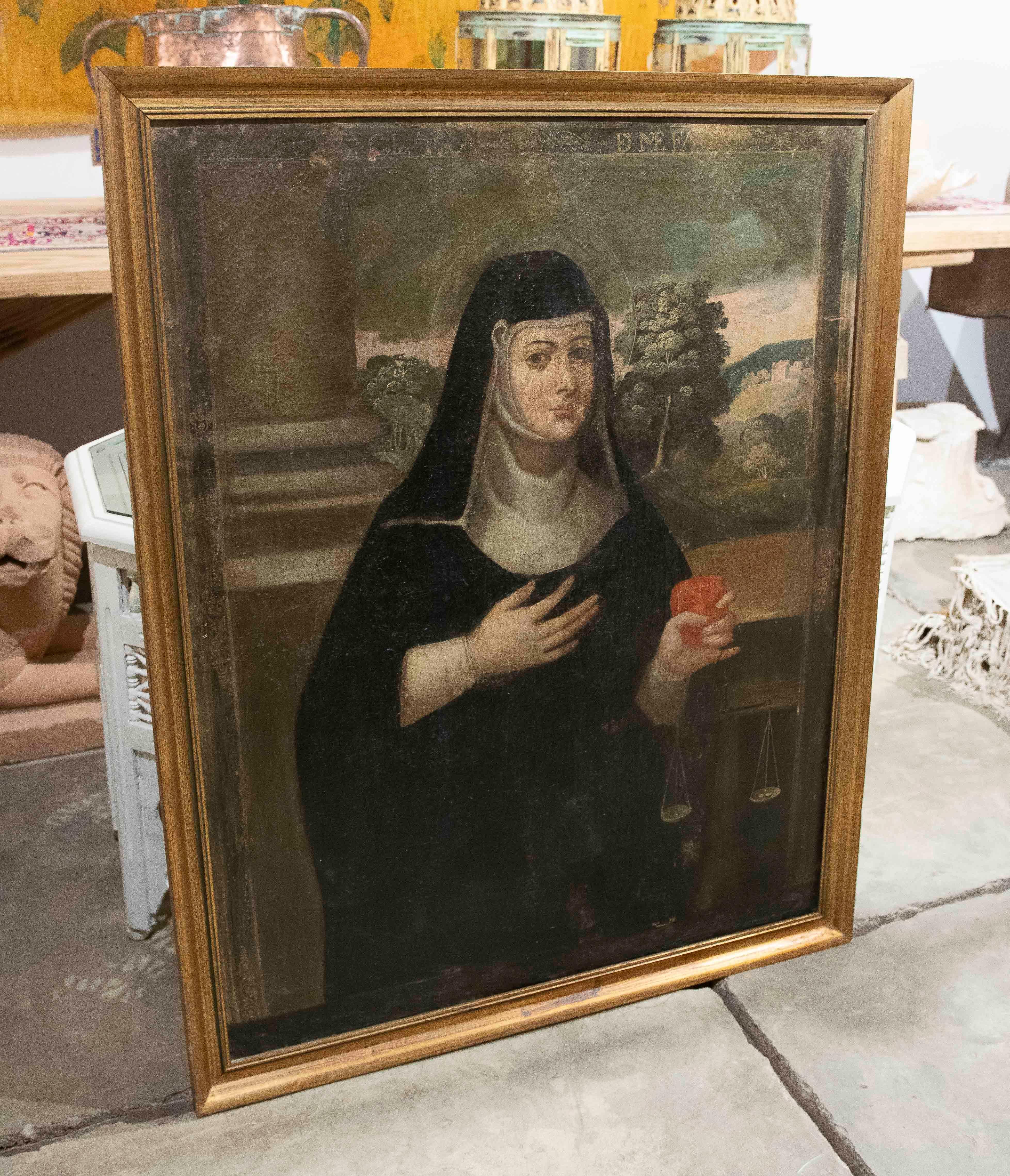 Spagnolo Quadro religioso del XVIII secolo raffigurante una suora dipinto a olio su tela con cornice in vendita