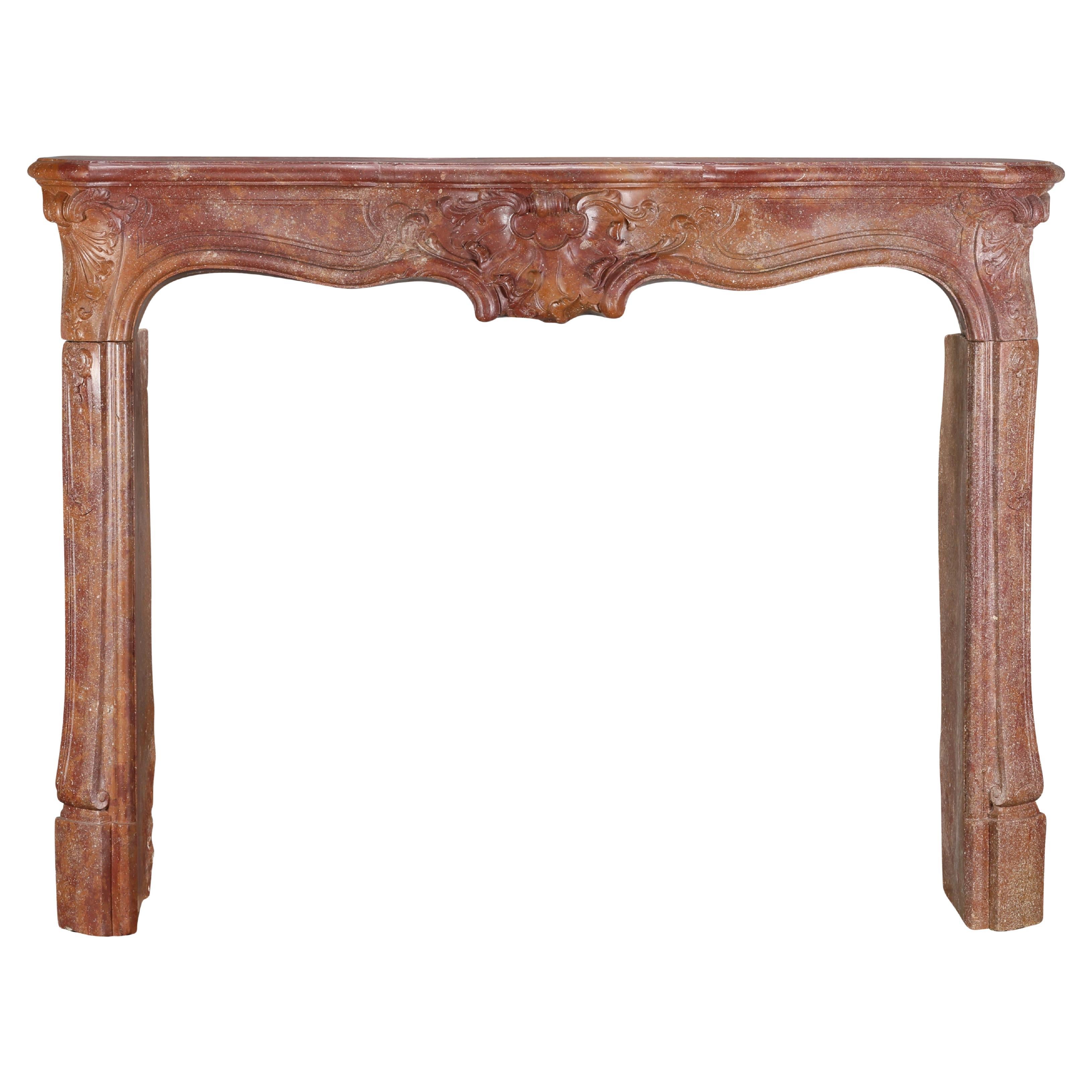 18th Century Rococo Fireplace Mantel In Reddish-Brown or Porphyry-Like Stone For Sale