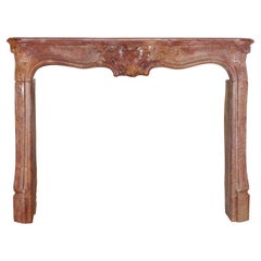 18th Century Rococo Fireplace Mantel In Reddish-Brown or Porphyry-Like Stone