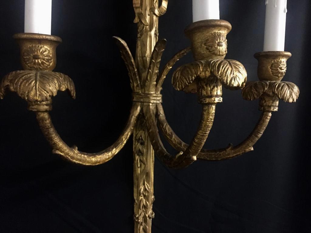 French 18th Century Rococo Giltwood Three-Light Wall Sconces For Sale