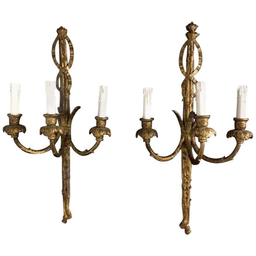 18th Century Rococo Giltwood Three-Light Wall Sconces For Sale