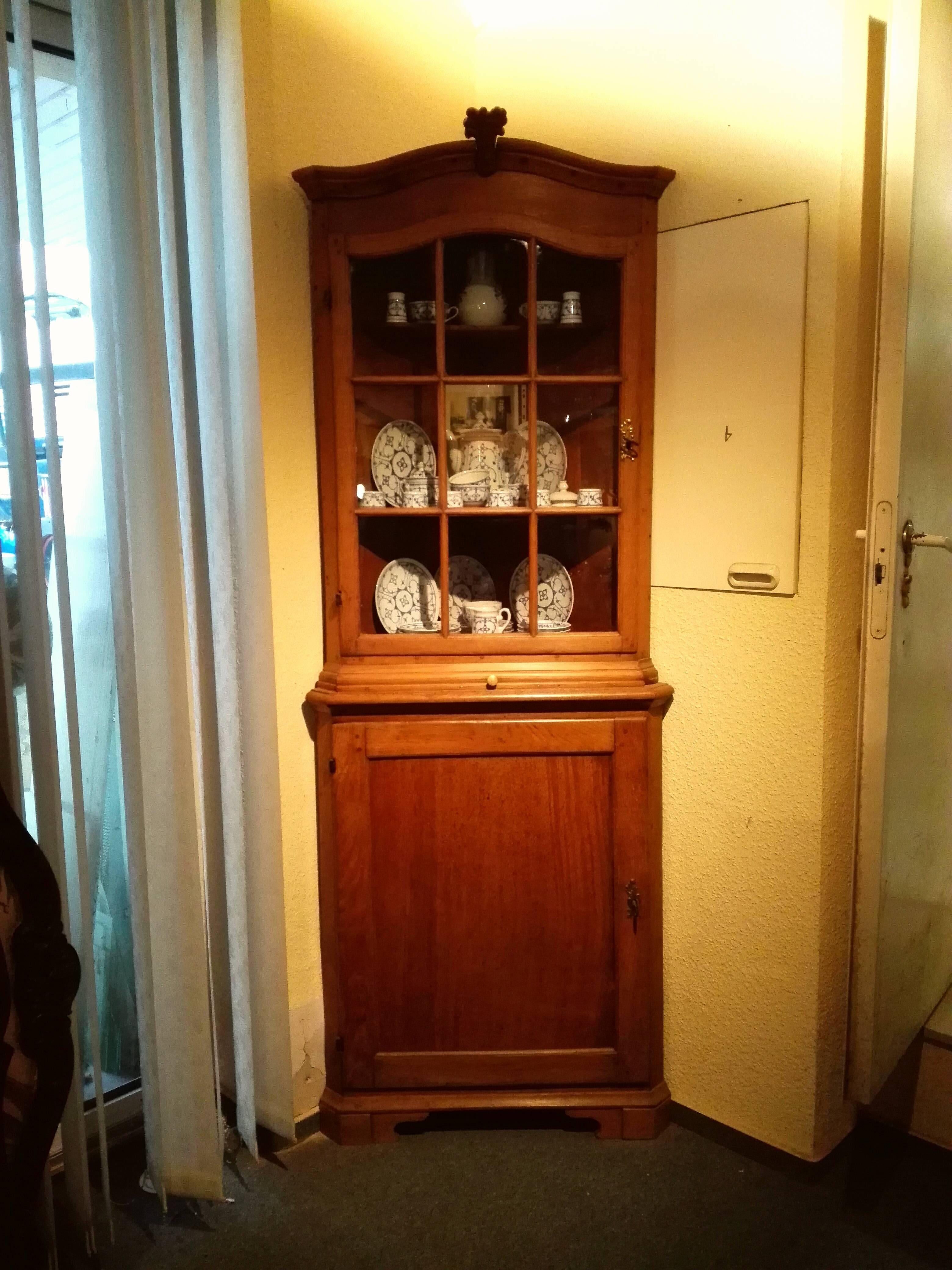 Please take a close look at the photos. On an original black and white photo witch we own in original, you can see this beautiful, slim and from the proportions small glass top corner cabinet, circa 1900! In front you can see the original owner