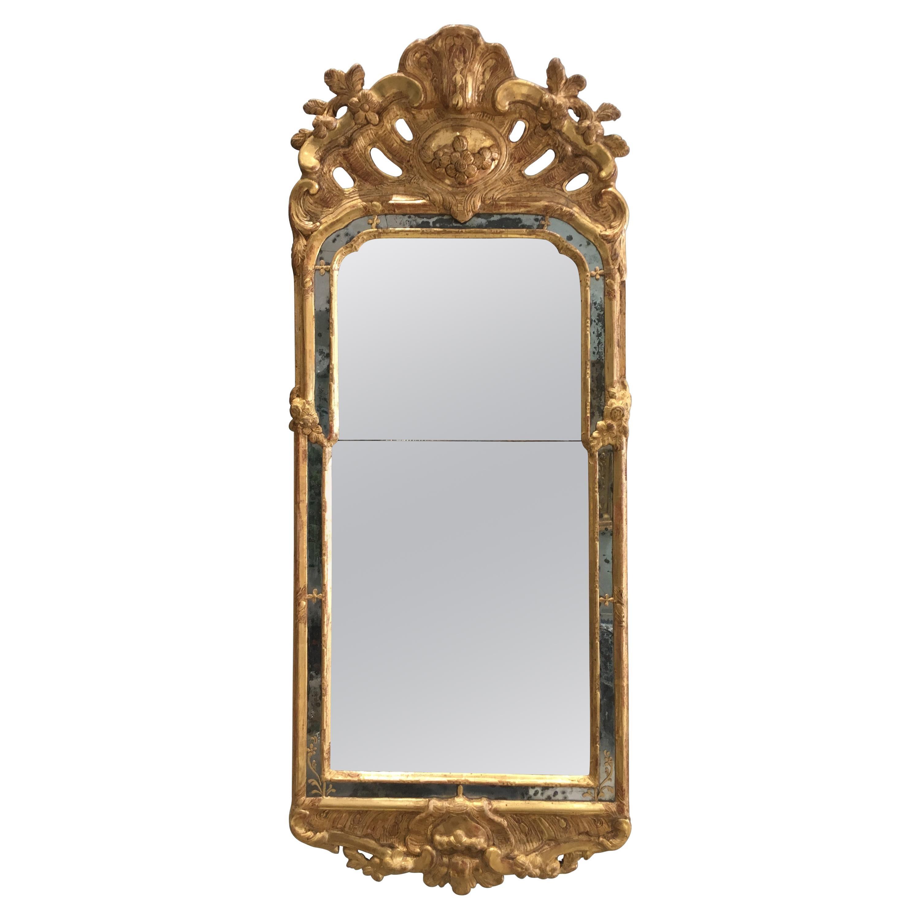 18th Century Rococo Swedish Mirror on Carved and Giltwood For Sale