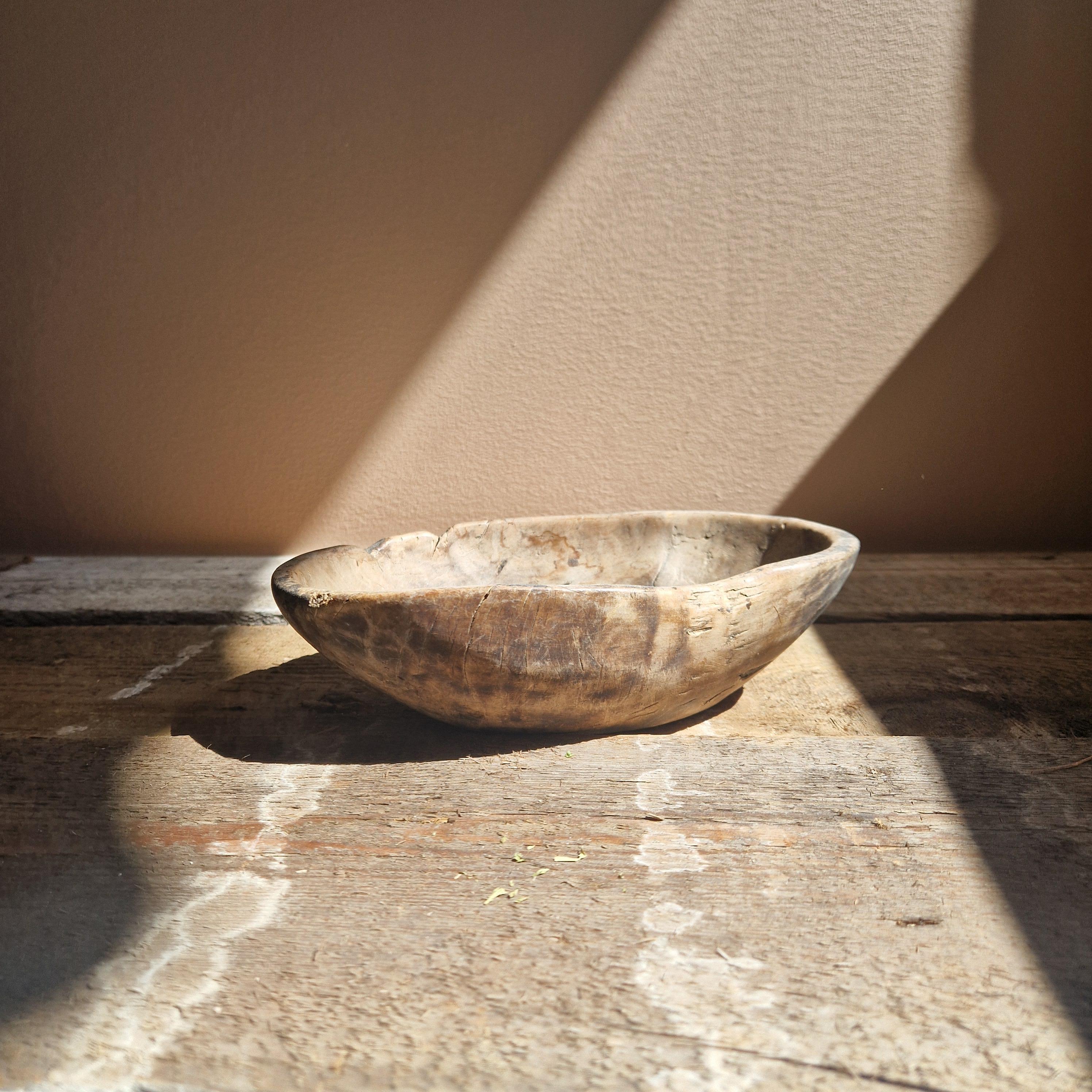 A beautiful root bowl. Hand carved in the 18th century. It is in great condition for it's age and have a wonderful patina.