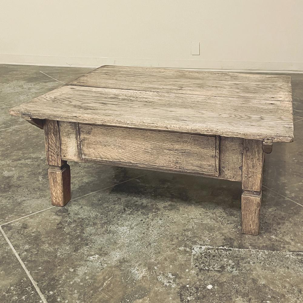 18th century Rustic Dutch coffee table in stripped oak represents the essence of form and function. The no-nonsense approach was a pragmatic feature of rural craftsmanship, where artisans used indigenous materials, like this fine old-growth oak, to