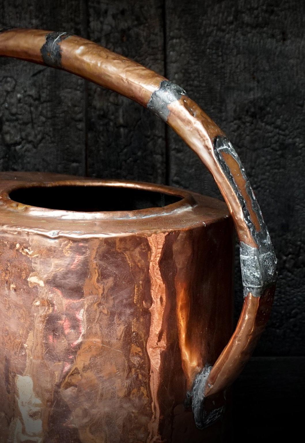 hammered copper watering can
