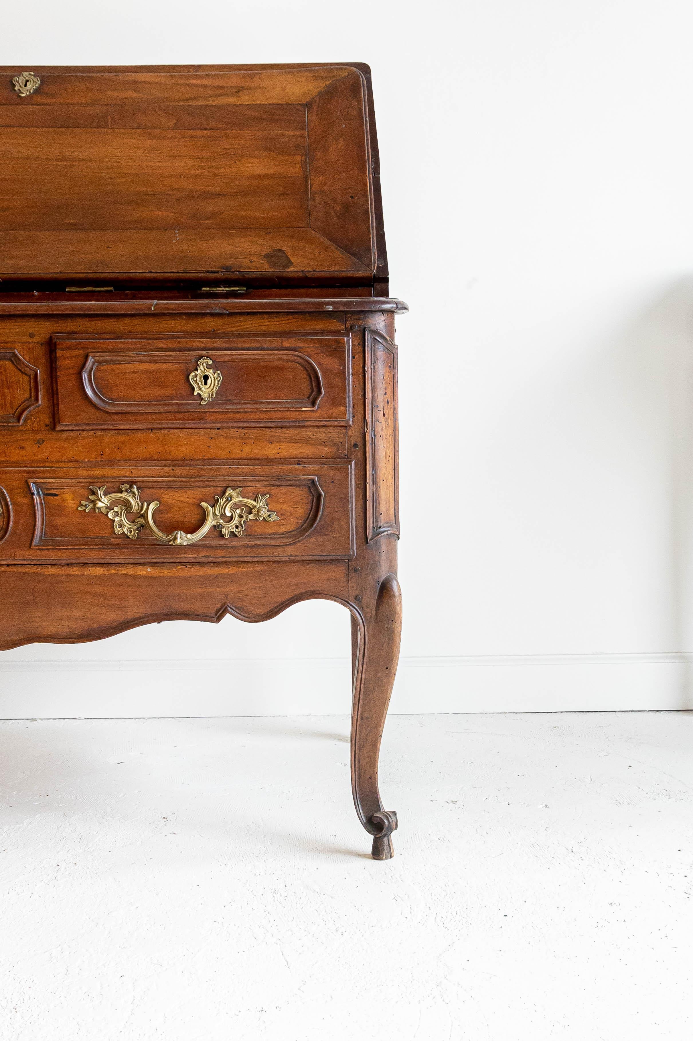 Period 18th century Secretaire, complete with fold down writing table and secret drawer. Recently waxed and polished, this piece is in excellent condition. 