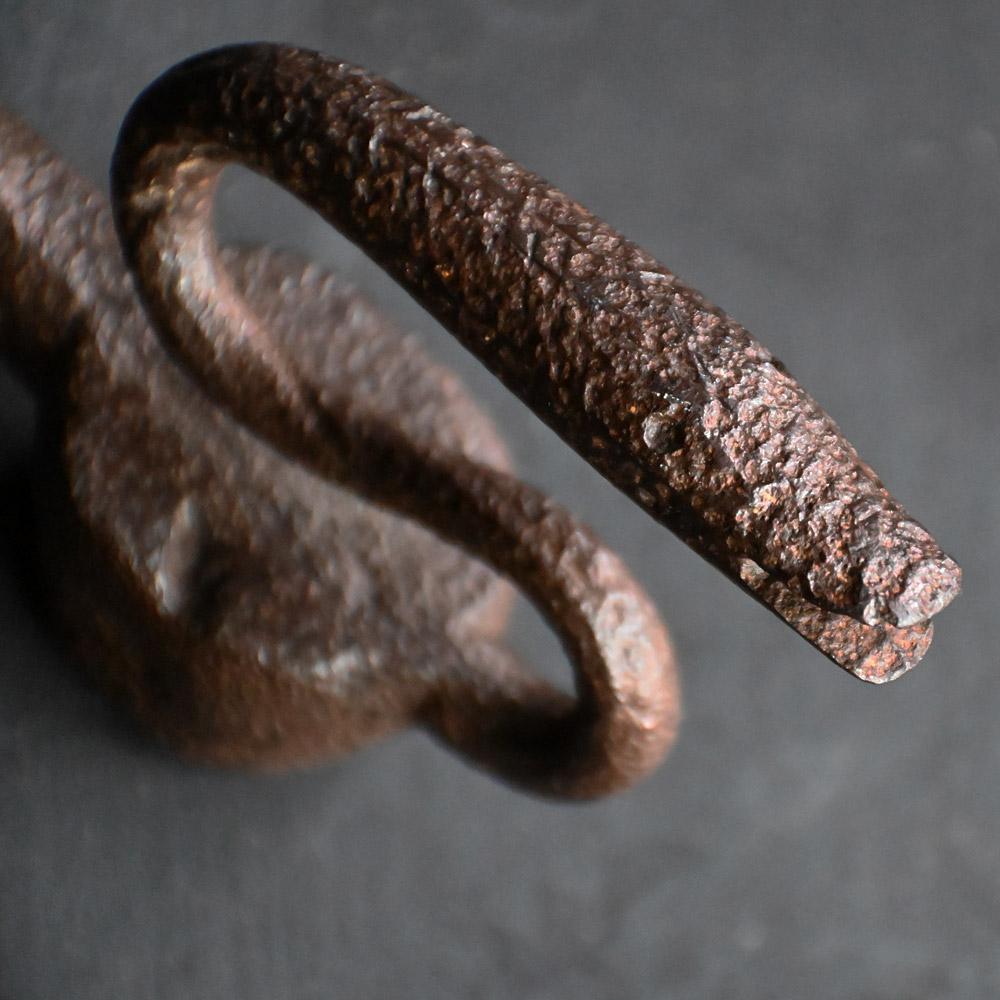 18th Century Serpent Door Knocker 

An unusual object in the form of a late 18th Century wrought iron door knocker in the shape of a serpent. 

Dimensions in inches: H 16” x W 1.5” x D 3.5”
Age: 18th Century   
Origin: Unknown
Condition: Fair
