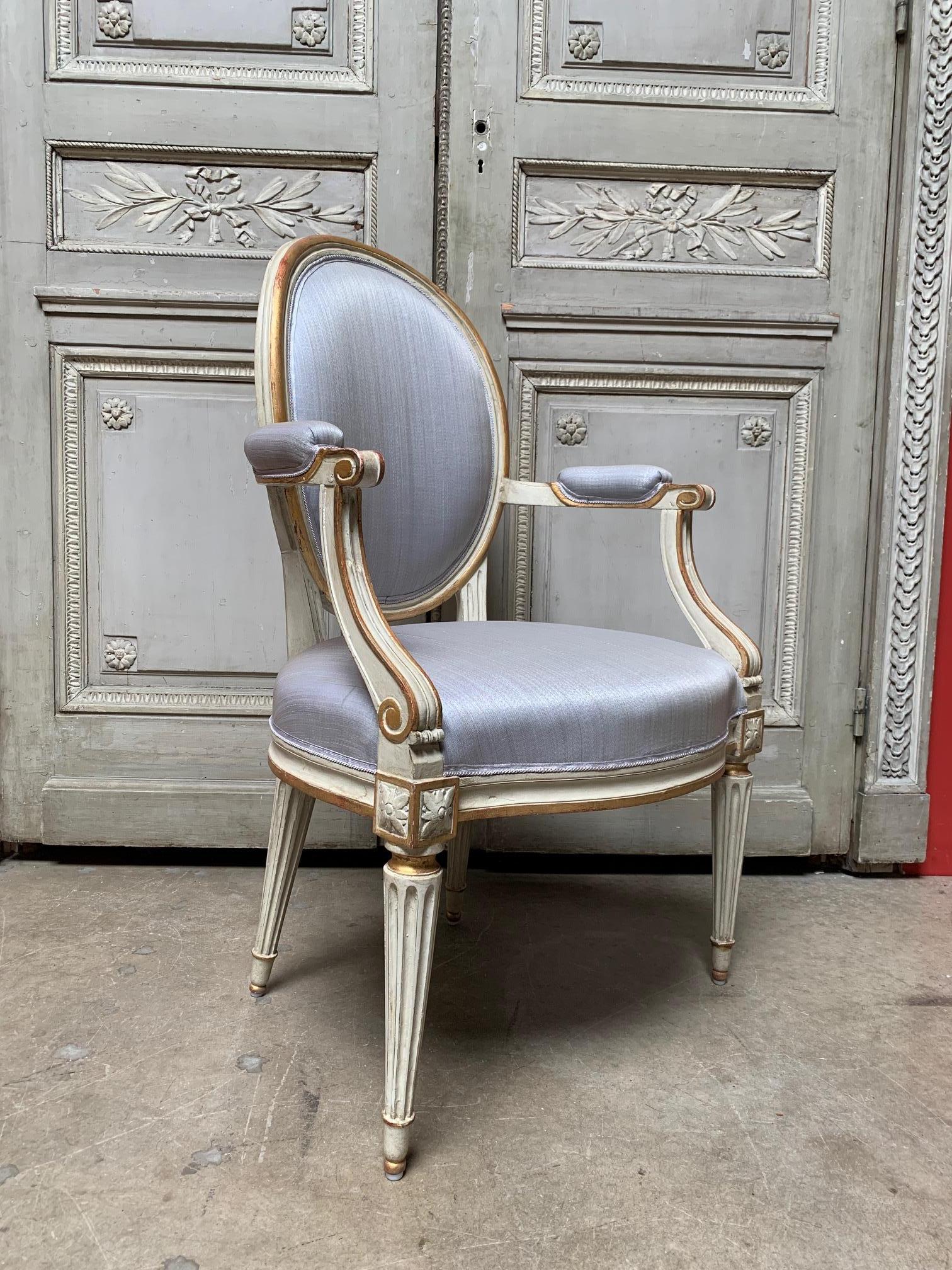 Carved 18th Century Set of Six Louis XVI Armchairs with a Gray and Gold Leaf Finish
