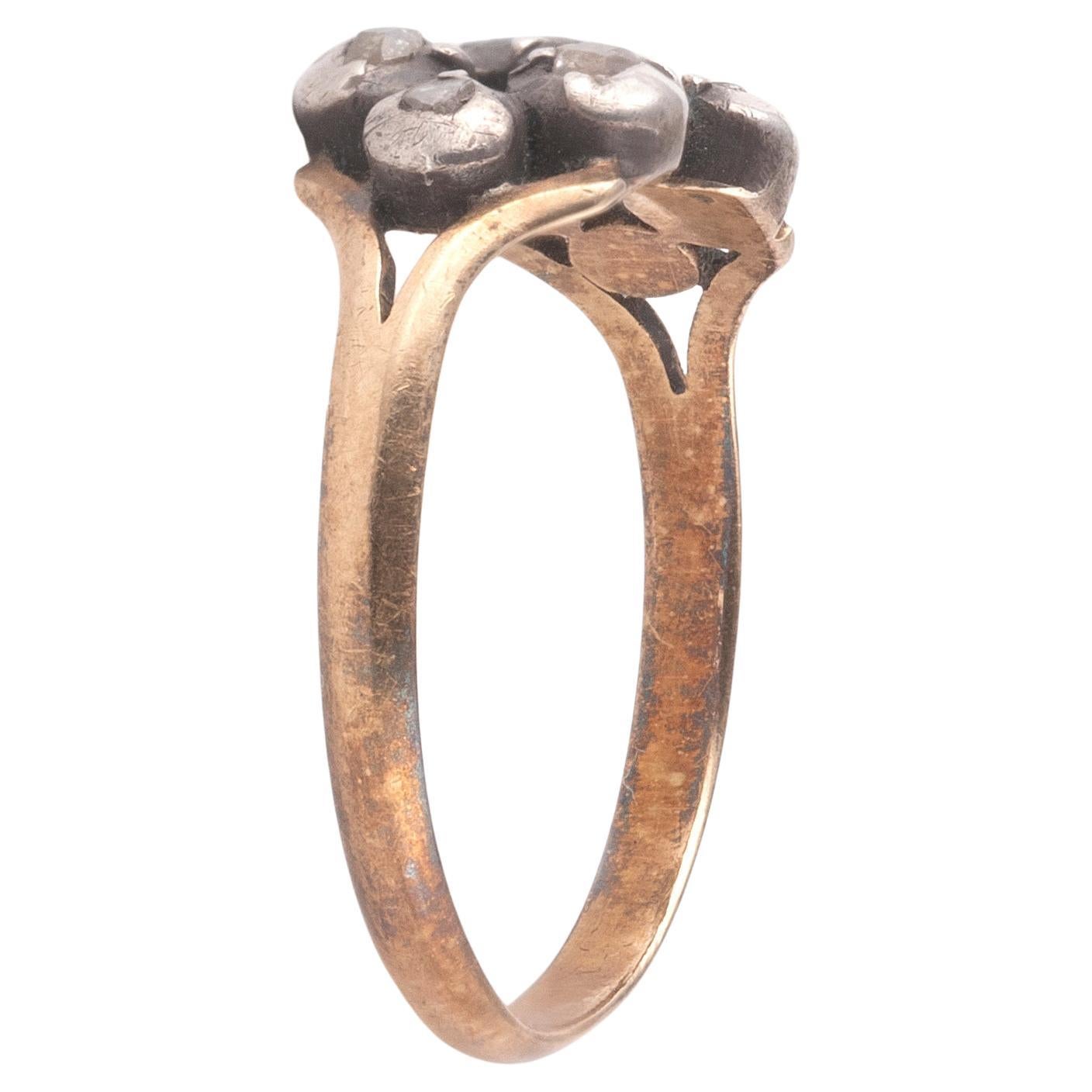 The arrangement of the stones, with a center flanked by two rows of threes, first became popular during the late 17th century; its form was intended to resemble that of a decorative bow, mounted in silver and gold.
Top size 15mm x 8mm

Weight: