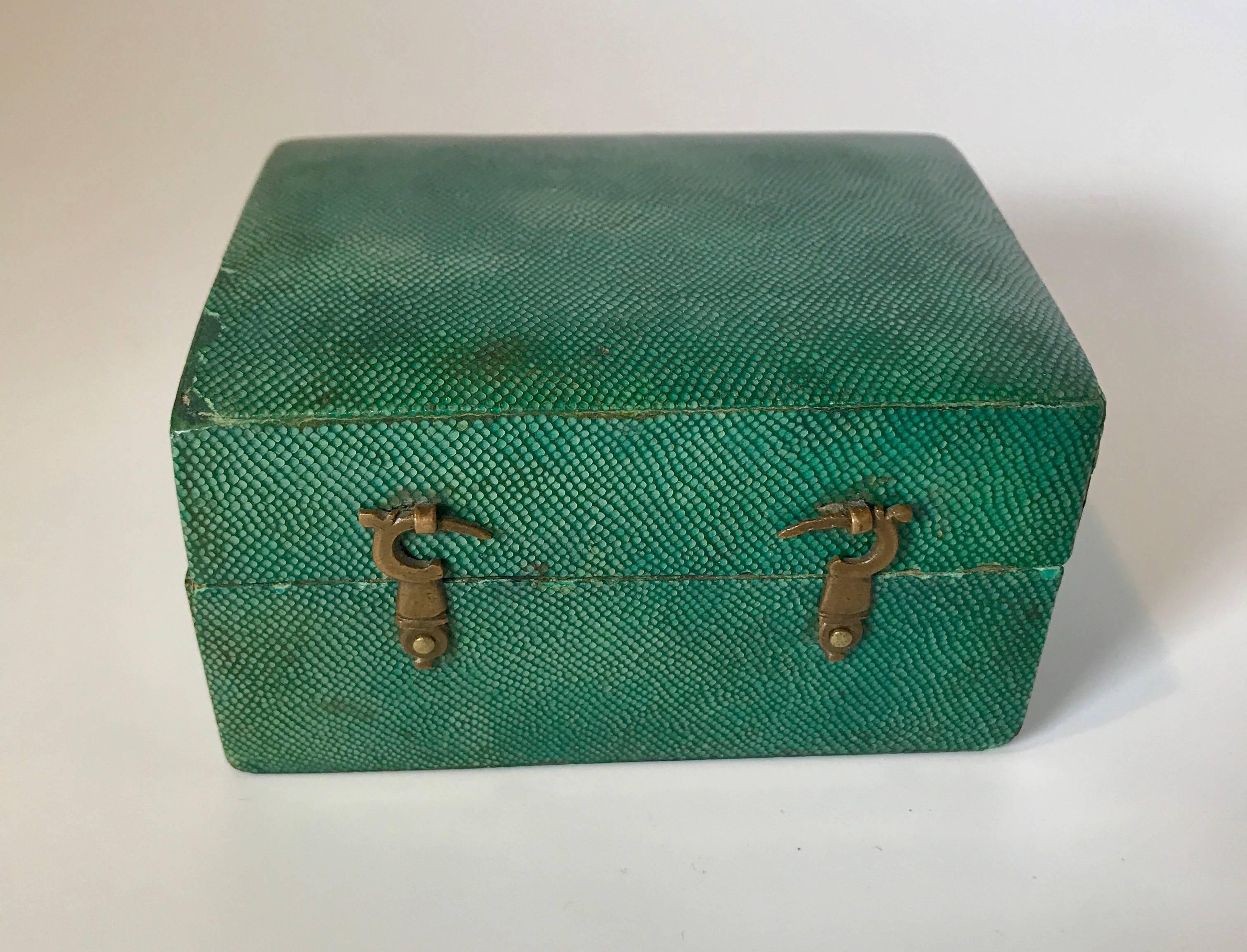 Mid-18th century shagreen box with green leather interior with hook and eye clasp.