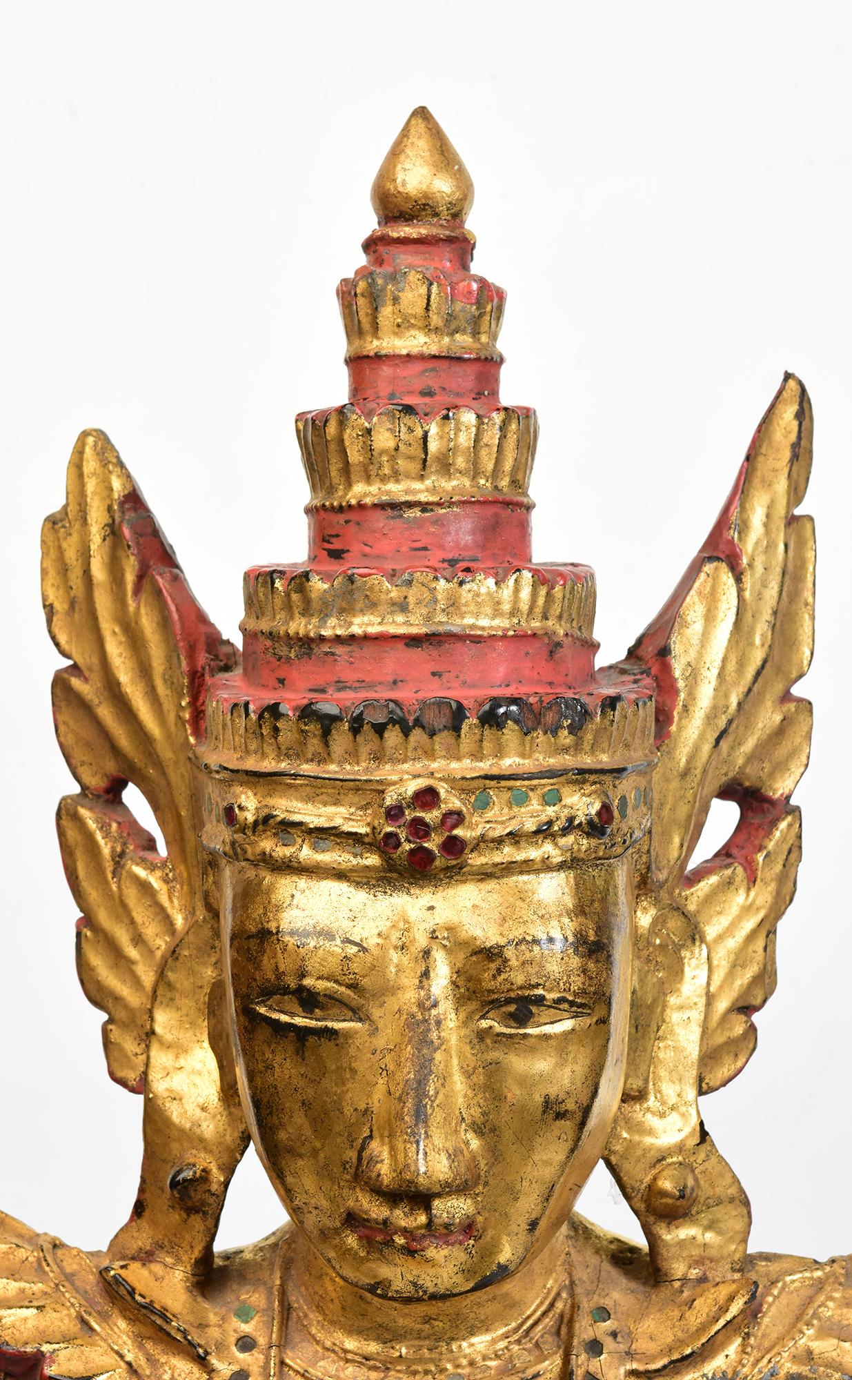 Antique Burmese wooden seated crowned Buddha, or sometimes known as 'King Buddha', wearing diadem-crowns and ornaments of kings instead of ordinary monk's robes.

Crowned Buddha represents the Buddha's role as a universal sovereign. 

Age: Burma,