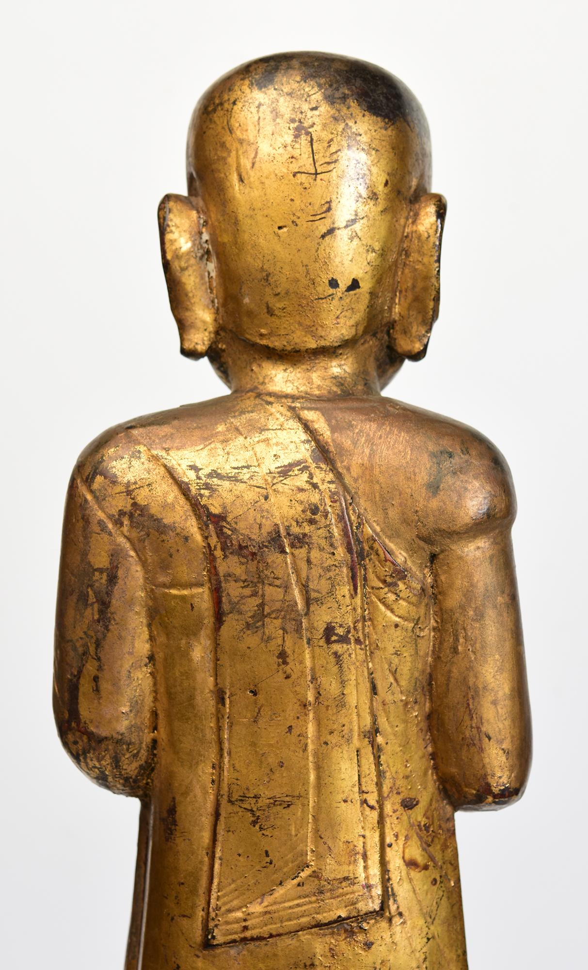 18th Century, Shan, Antique Burmese Wooden Standing Disciple / Monk Holding Bowl For Sale 5