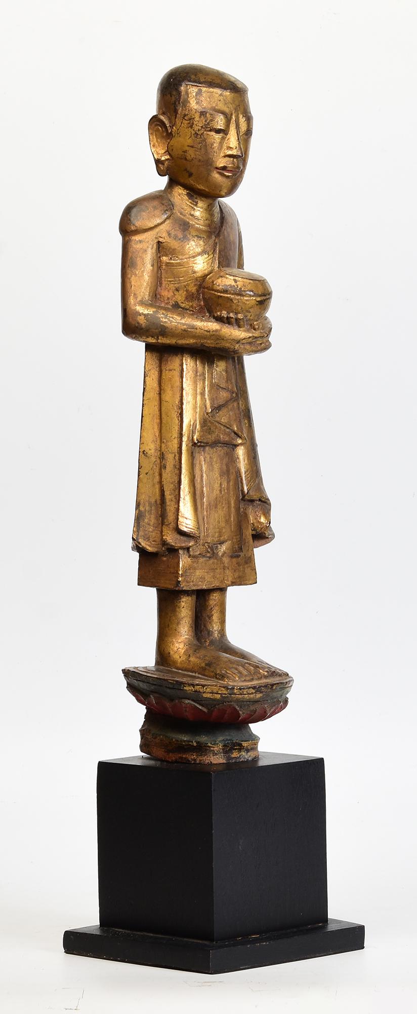 18th Century, Shan, Antique Burmese Wooden Standing Disciple / Monk Holding Bowl For Sale 7