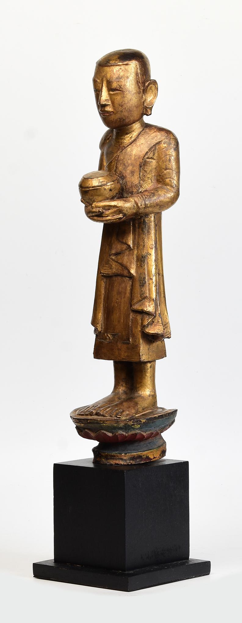 18th Century, Shan, Antique Burmese Wooden Standing Disciple / Monk Holding Bowl For Sale 2