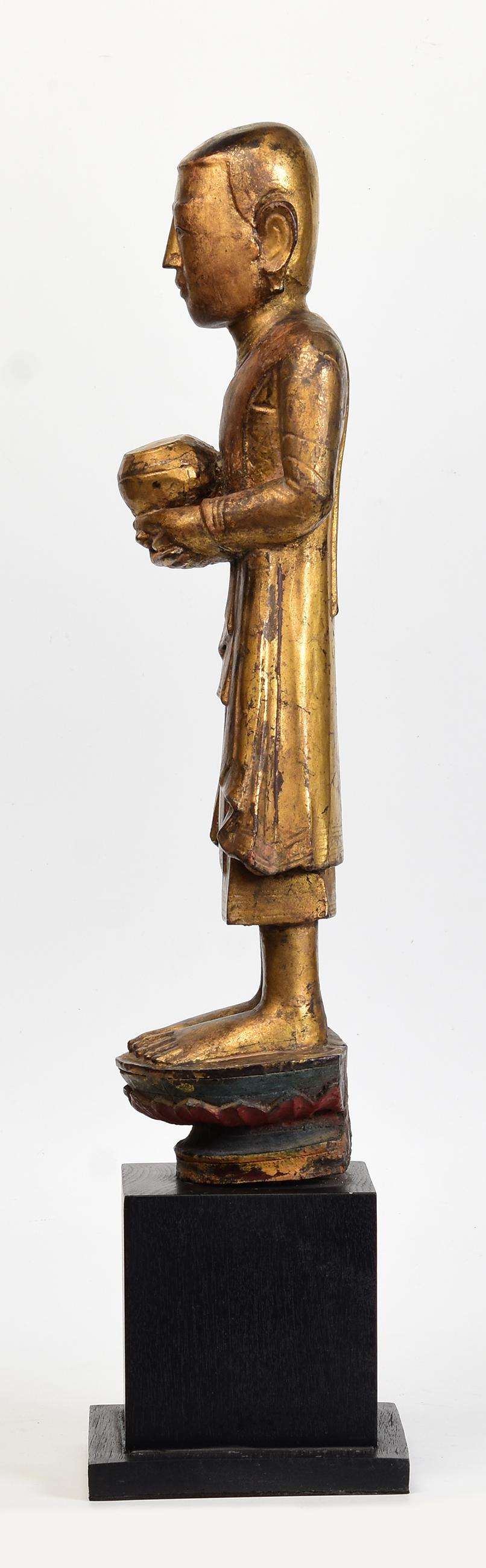 18th Century, Shan, Antique Burmese Wooden Standing Disciple / Monk Holding Bowl For Sale 3