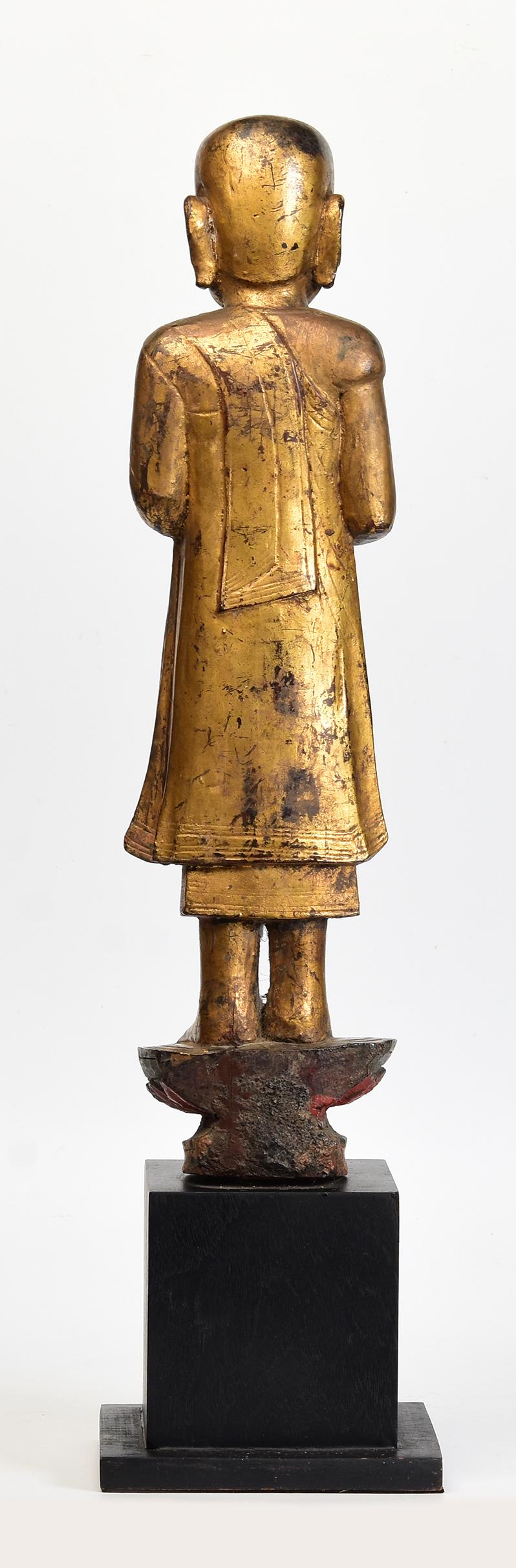 18th Century, Shan, Antique Burmese Wooden Standing Disciple / Monk Holding Bowl For Sale 4