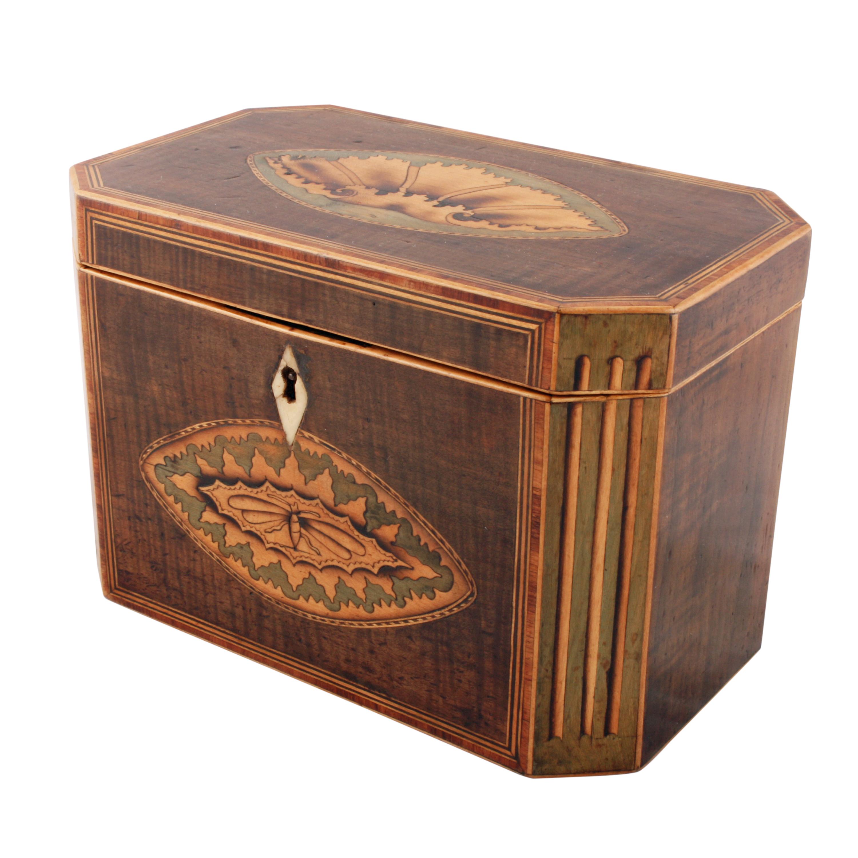

18th century sheraton tea caddy


An 18th century Georgian Sheraton design mahogany inlaid tea caddy.

The caddy is veneered with fiddleback mahogany, has box wood edges with many inlays and cross banding.

The lid has a large oval shell