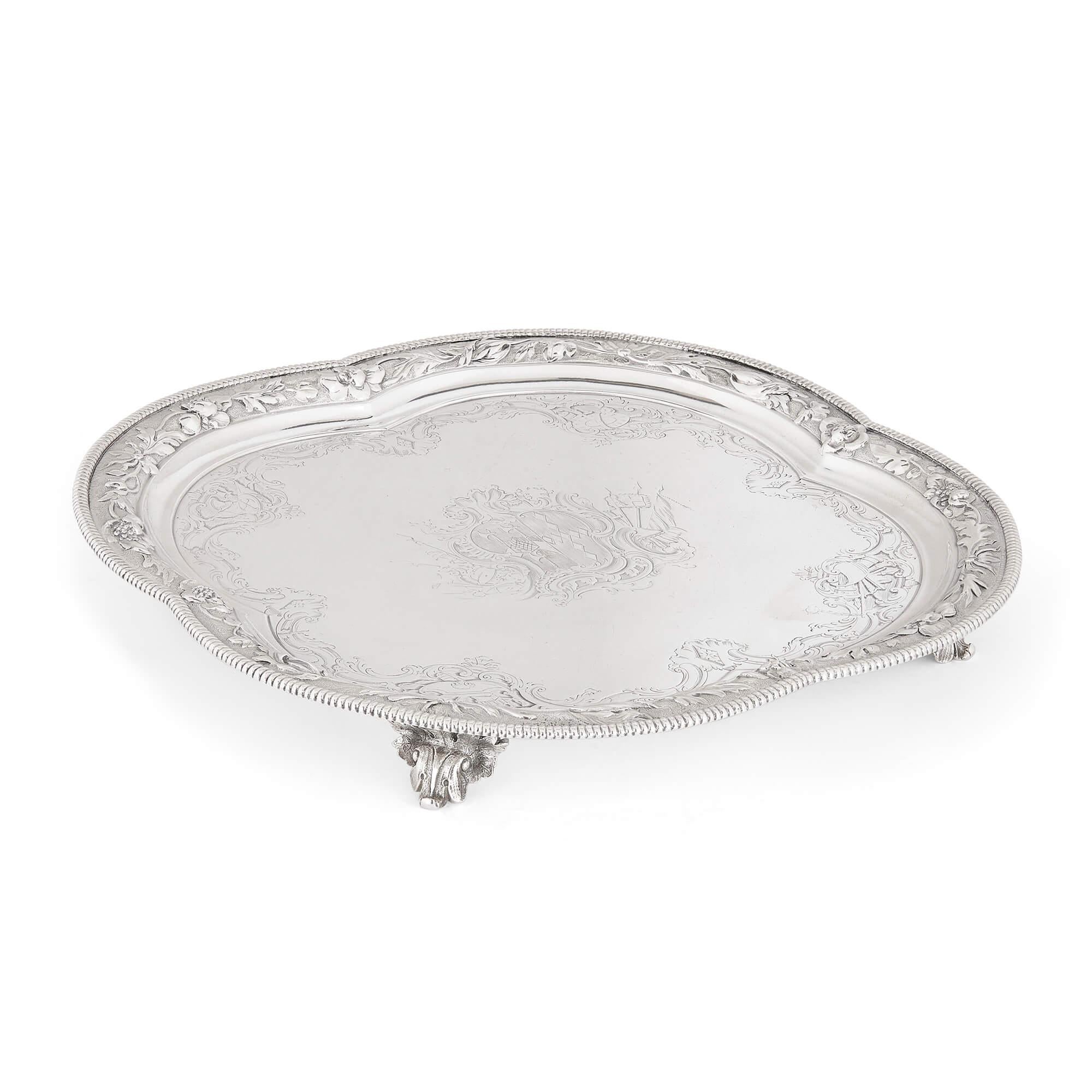 18th century silver salver by Paul de Lamerie 
English, 1744
Height 3cm, diameter 27cm

Hailing from the workshop of the eminent Dutch-born English silversmith, Paul de Lamerie (1688-1751), this silver salver exhibits exquisite craftsmanship and