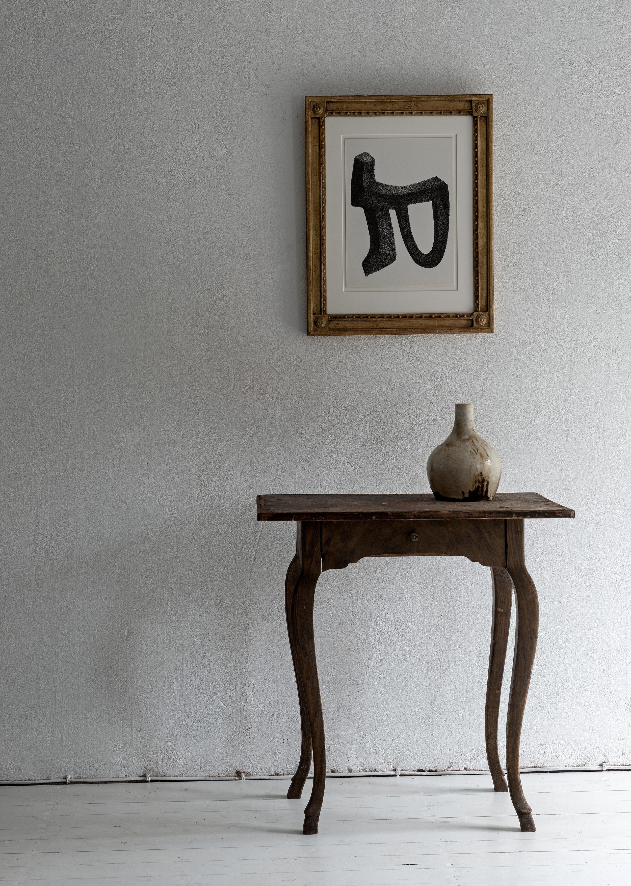 A very elegant 18th century small console table in original dark faux painted finish. Beautiful soft lines, works in a traditional or contemporary setting.