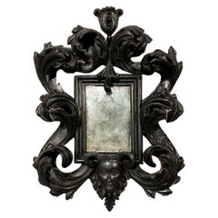 18th CENTURY SMALL EBONIZED WOOD MIRROR