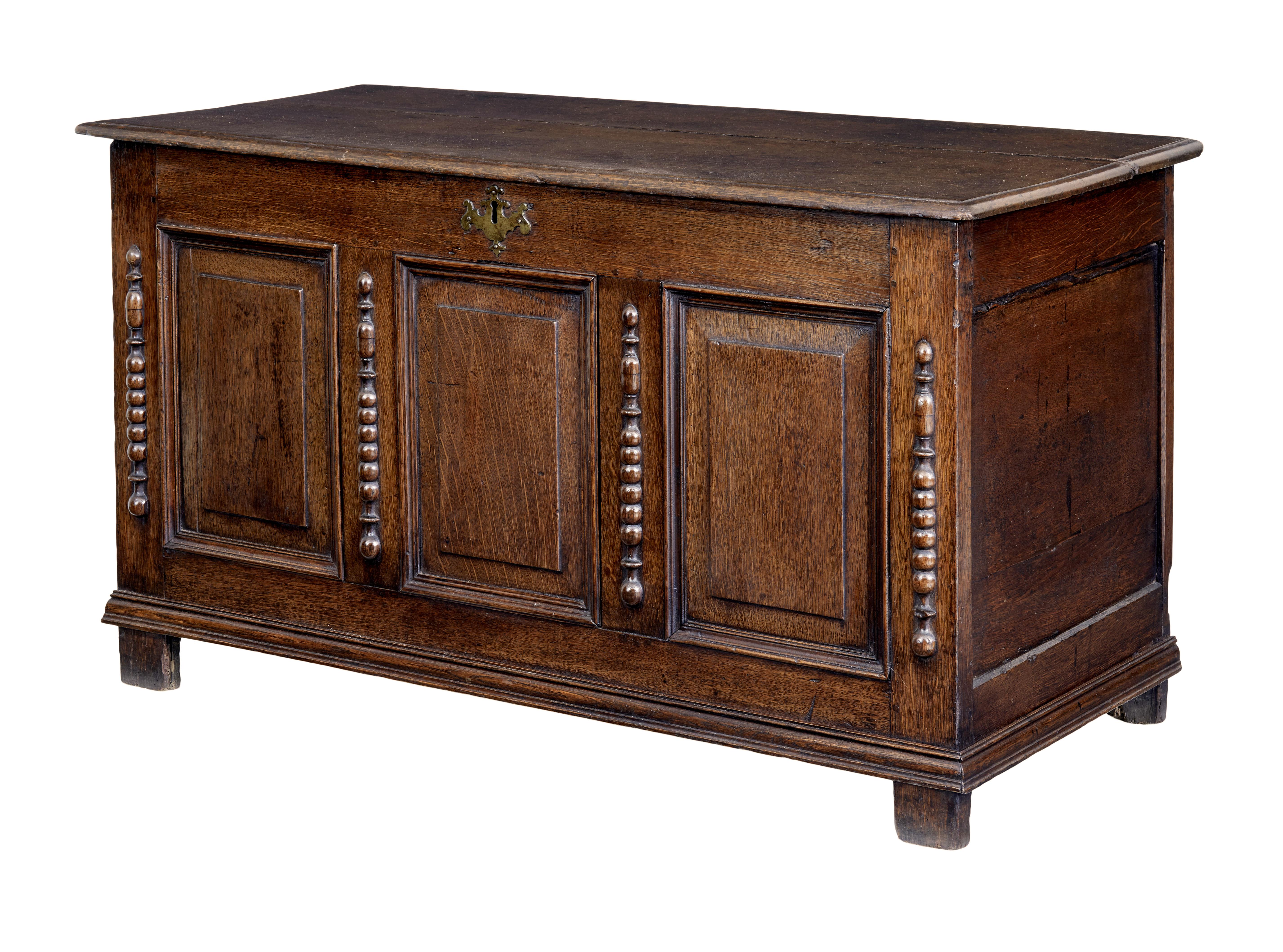 18th century small English oak coffer circa 1790.

3 fielded panels to the front each flanked by a beaded decoration. Good colour and patina, lid opens on original hinges to reveal storage space.

Expected age splits between planks to top and