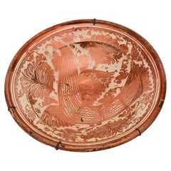 Piatto in ceramica di Manises Valencia del XVIII secolo con decorazione a lustro