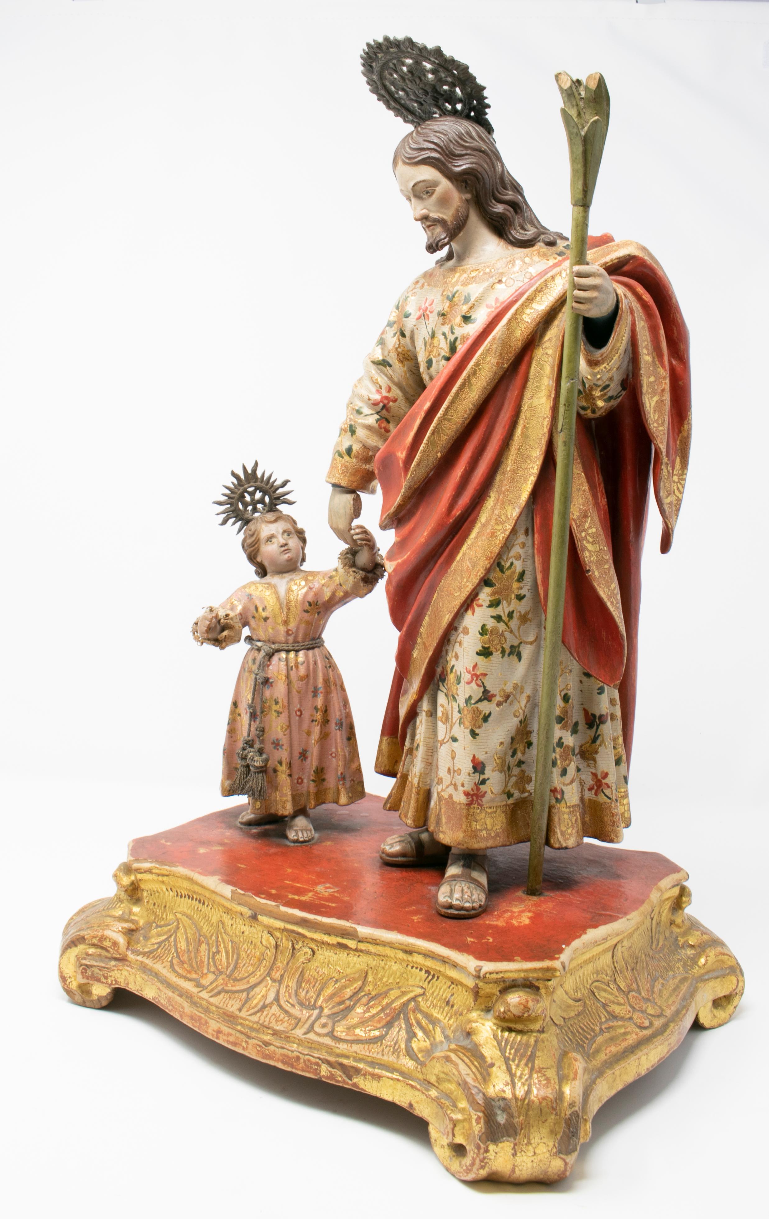 18th century Spanish Andalusian giltwood painted St. Joseph with Baby Jesus figure sculpture.