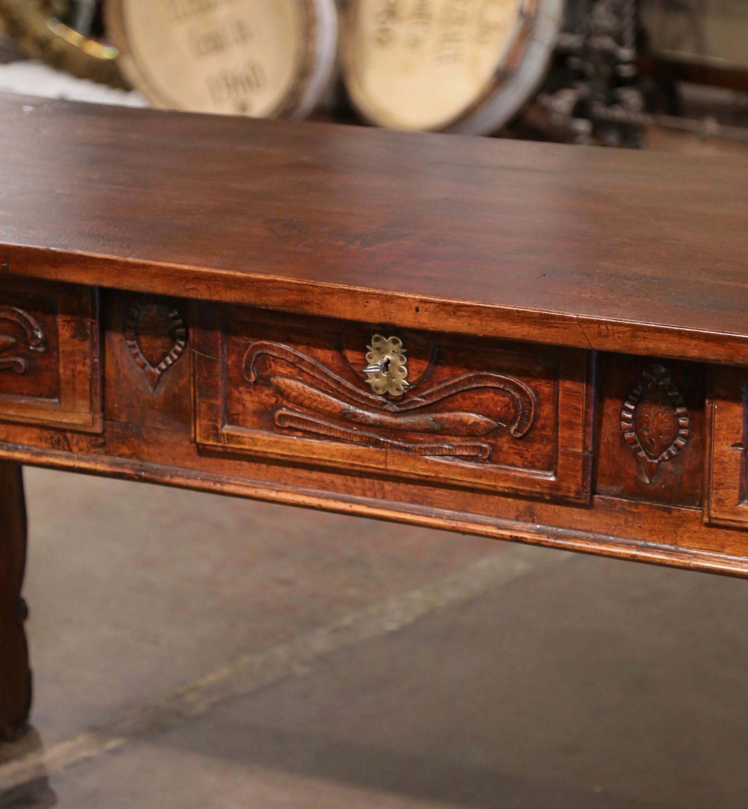 Patinated 18th Century Spanish Carved Walnut Single Plank Top Three-Drawer Console Table For Sale