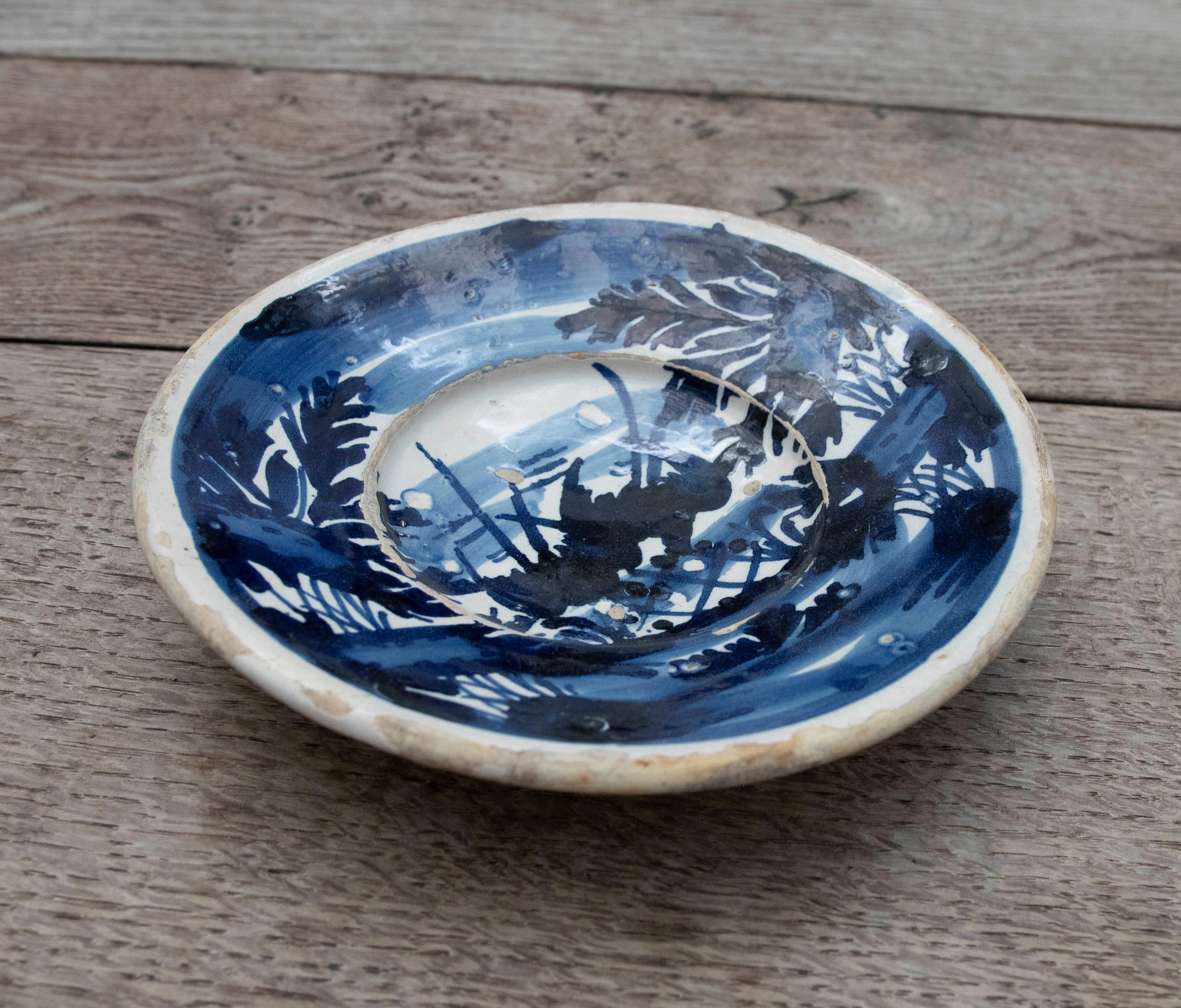 Glazed 18th Century Spanish Ceramic Plate with a Country Scene For Sale