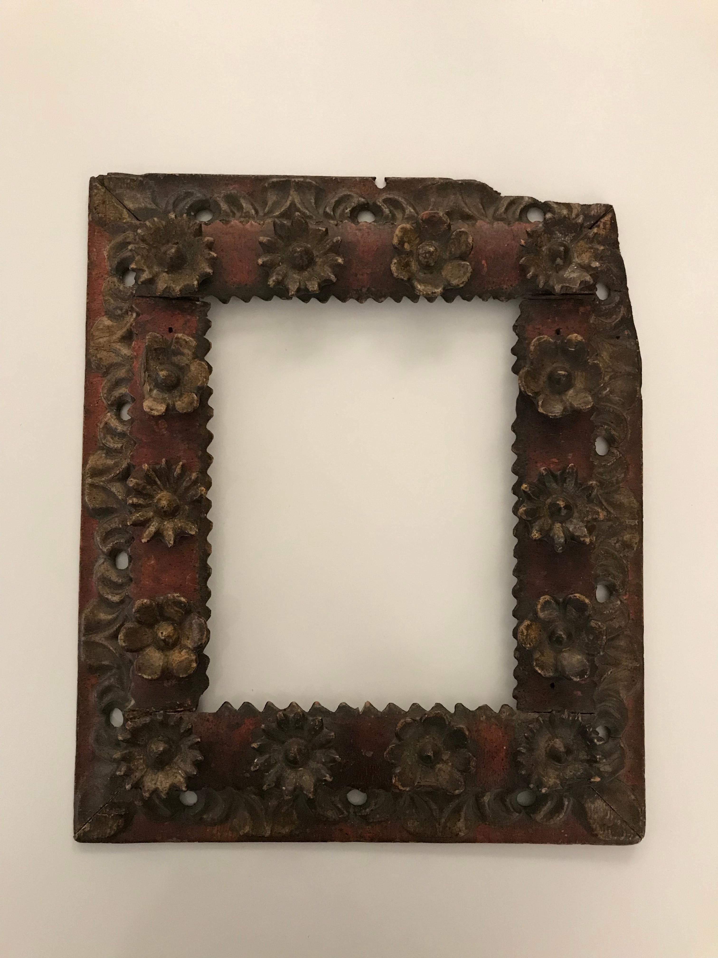 Original 18th century hand carved painted and applied ornament picture frame; continuous carved floral motif.