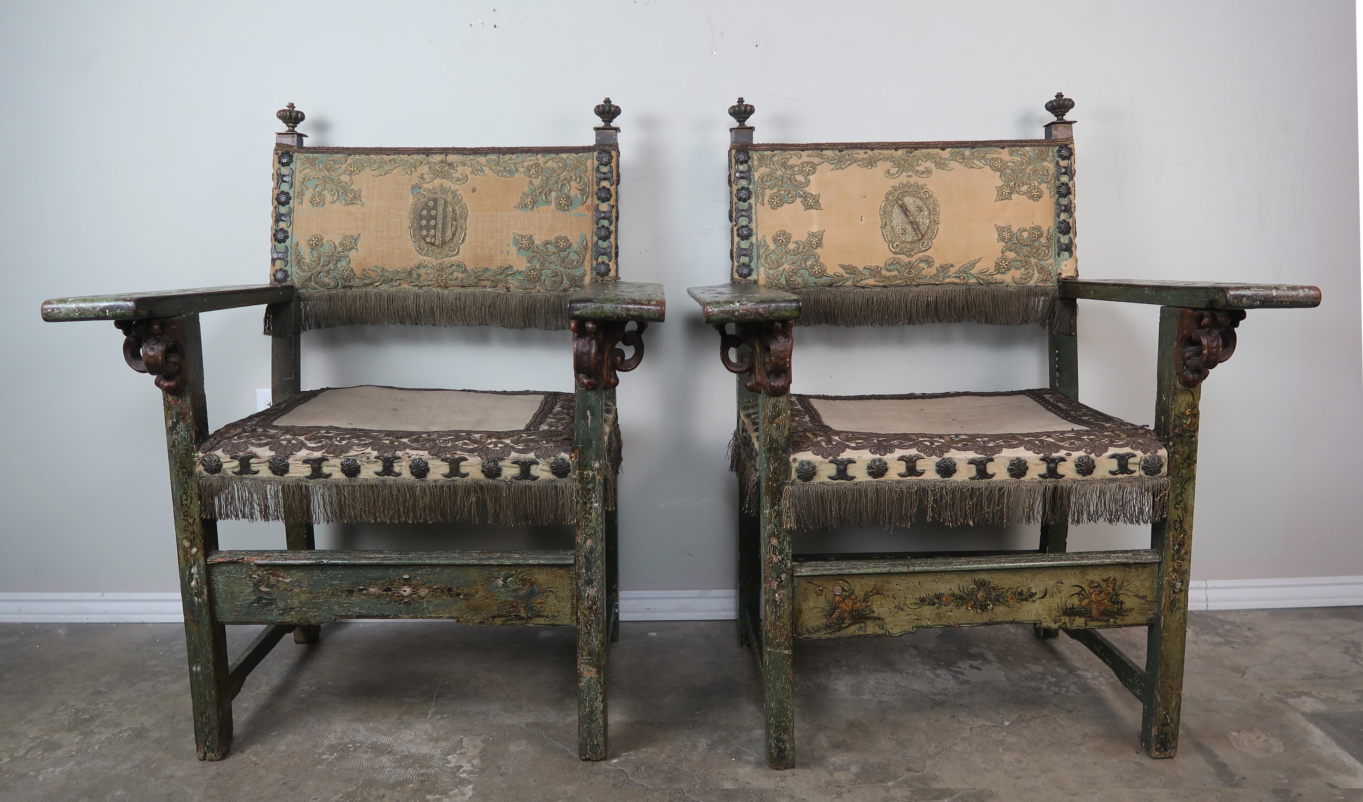 18th century Spanish Colonial painted armchairs with metallic embroidery, laces and trims. The chairs are a green colored painted finish with raised chinoiserie designs throughout.
Measures: Seat height 21