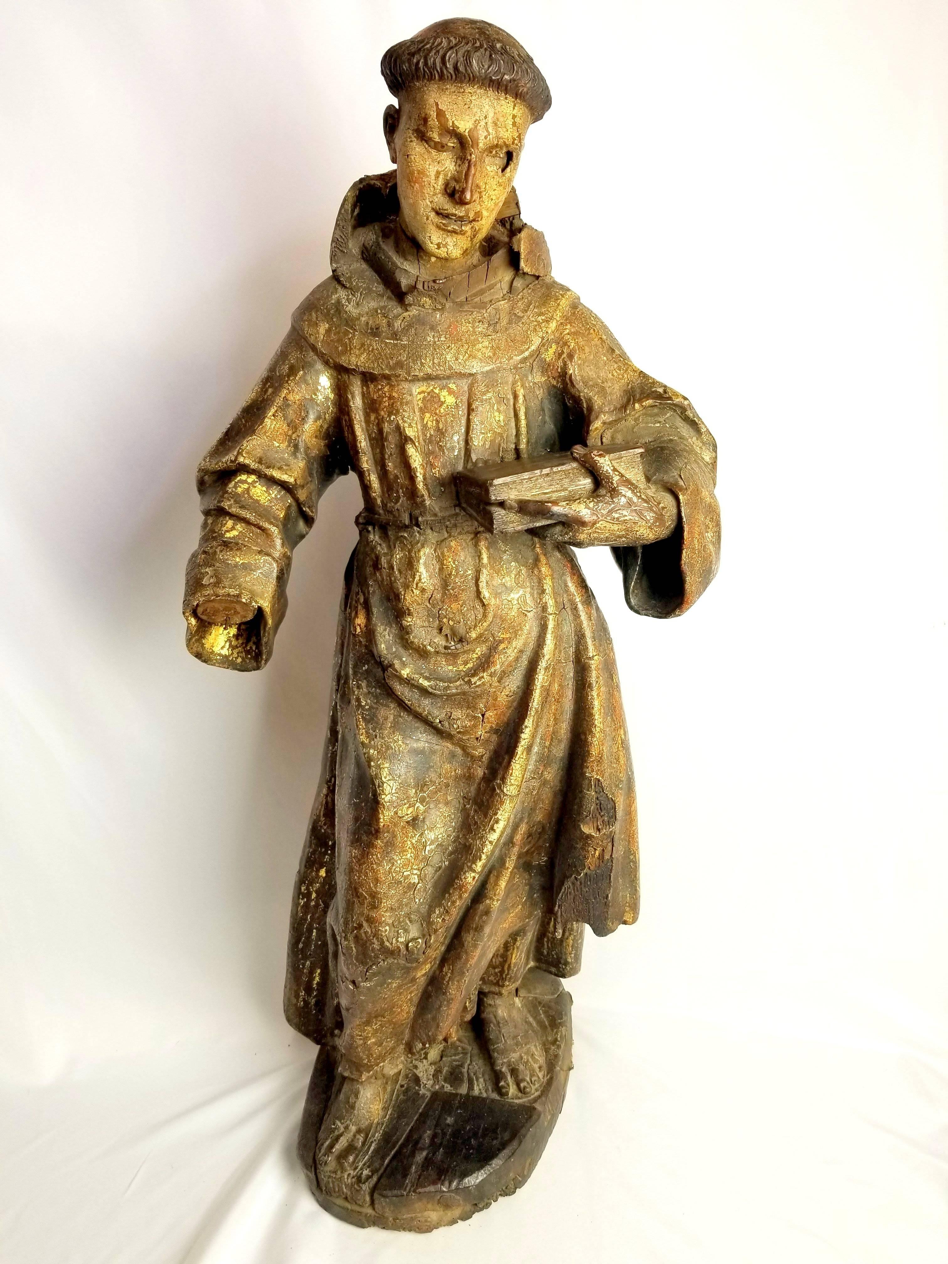 18th century Spanish colonial Santos of St. Francis. Carved wooden polychrome and finely finished with remaining traces of heavy gilt work. Excellent detail to hands with veins and delicate fingers as well as facial features with glass eyes, tongue