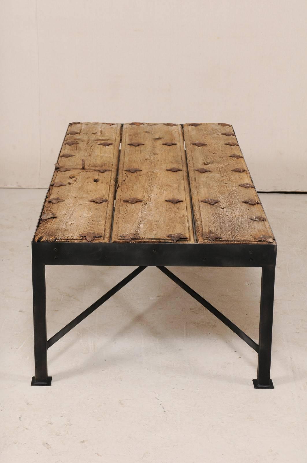 18th Century Spanish Door Coffee Table with Patinated Iron Quatrefoil Grommets 1