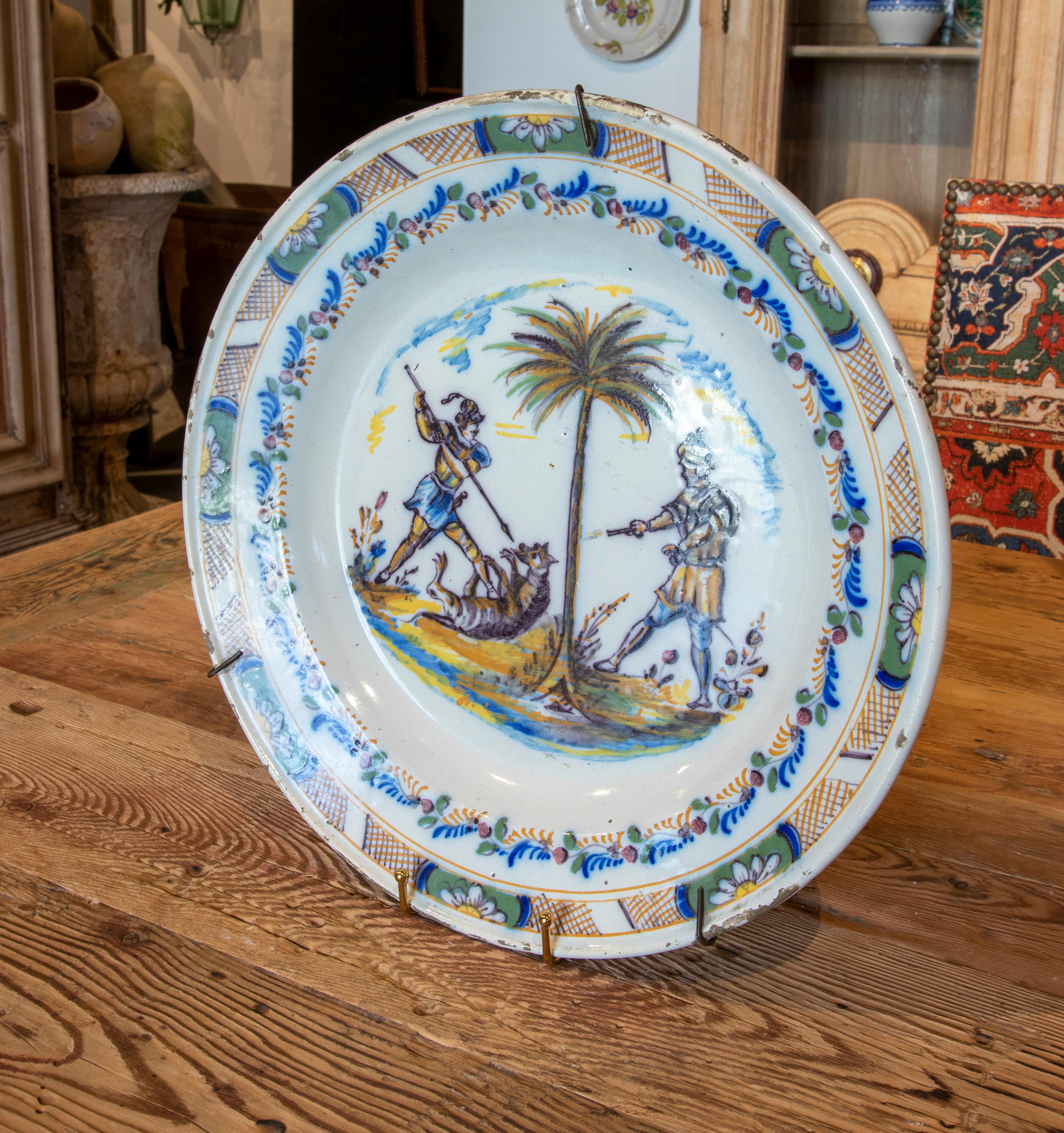 18th Century Spanish hand-painted glazed ceramic plate from Triana.