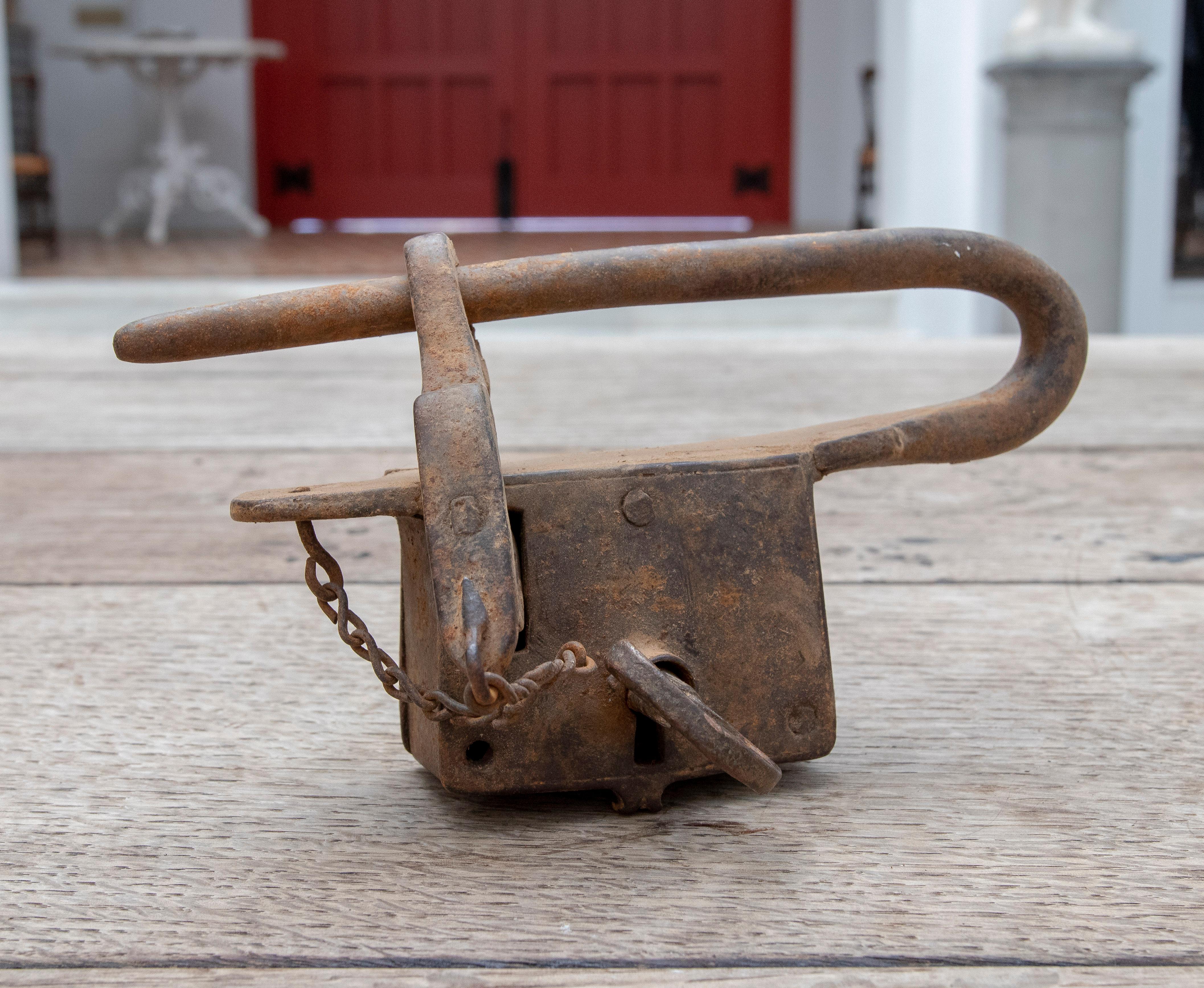 18th century Spanish iron padlock with original key.