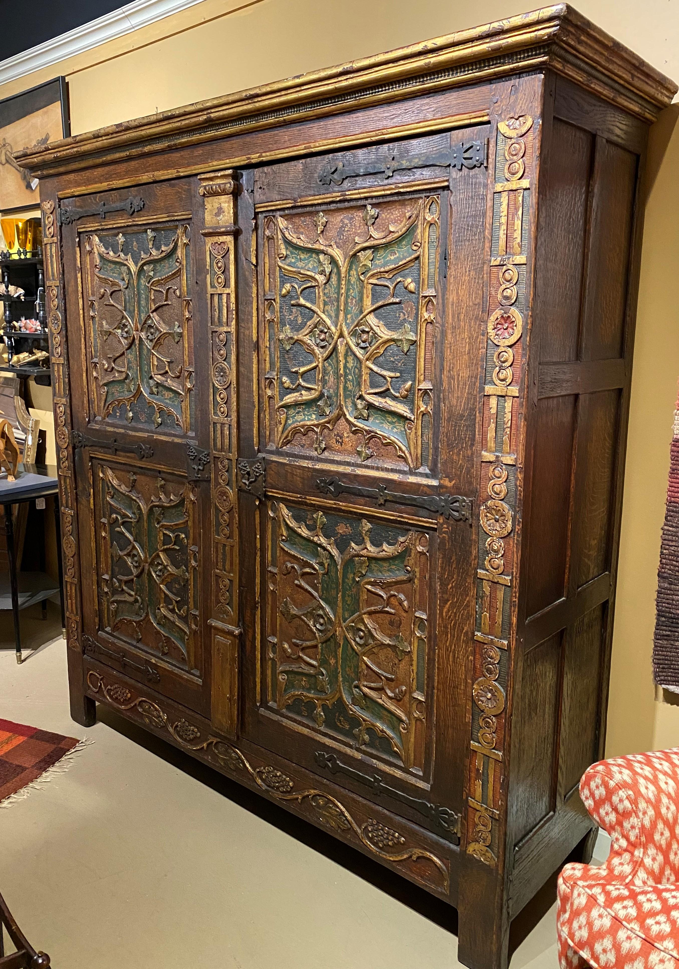 18th Century Spanish Oak Armoire with Relief Polychrome Decoration For Sale  at 1stDibs