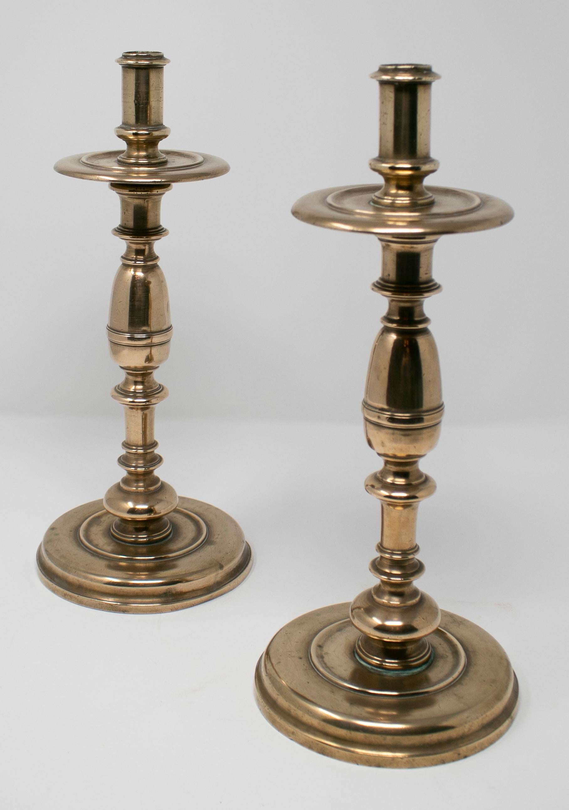 18th century Spanish pair of bronze candlesticks.

 