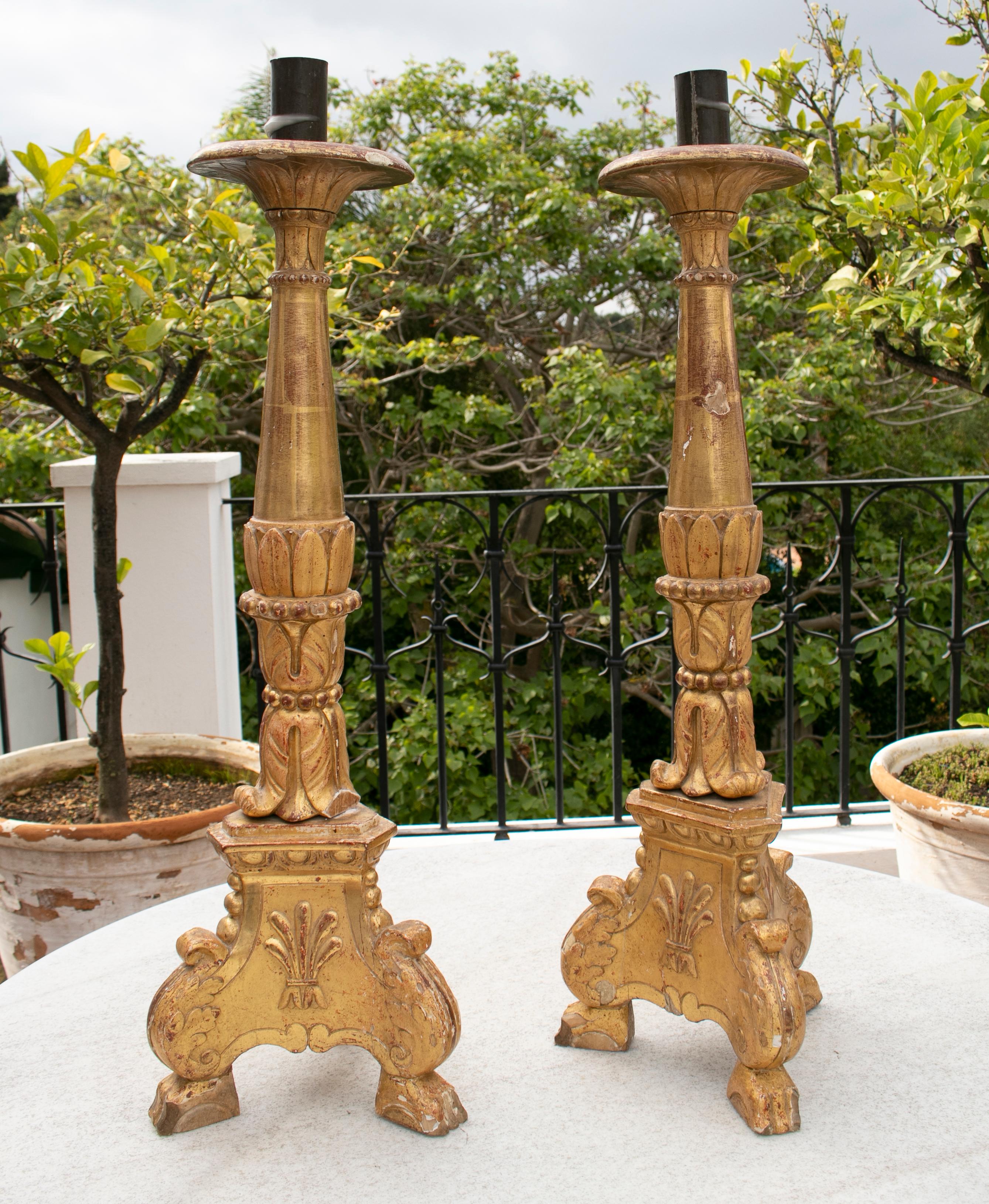 18th century Spanish pair of giltwood candlesticks.