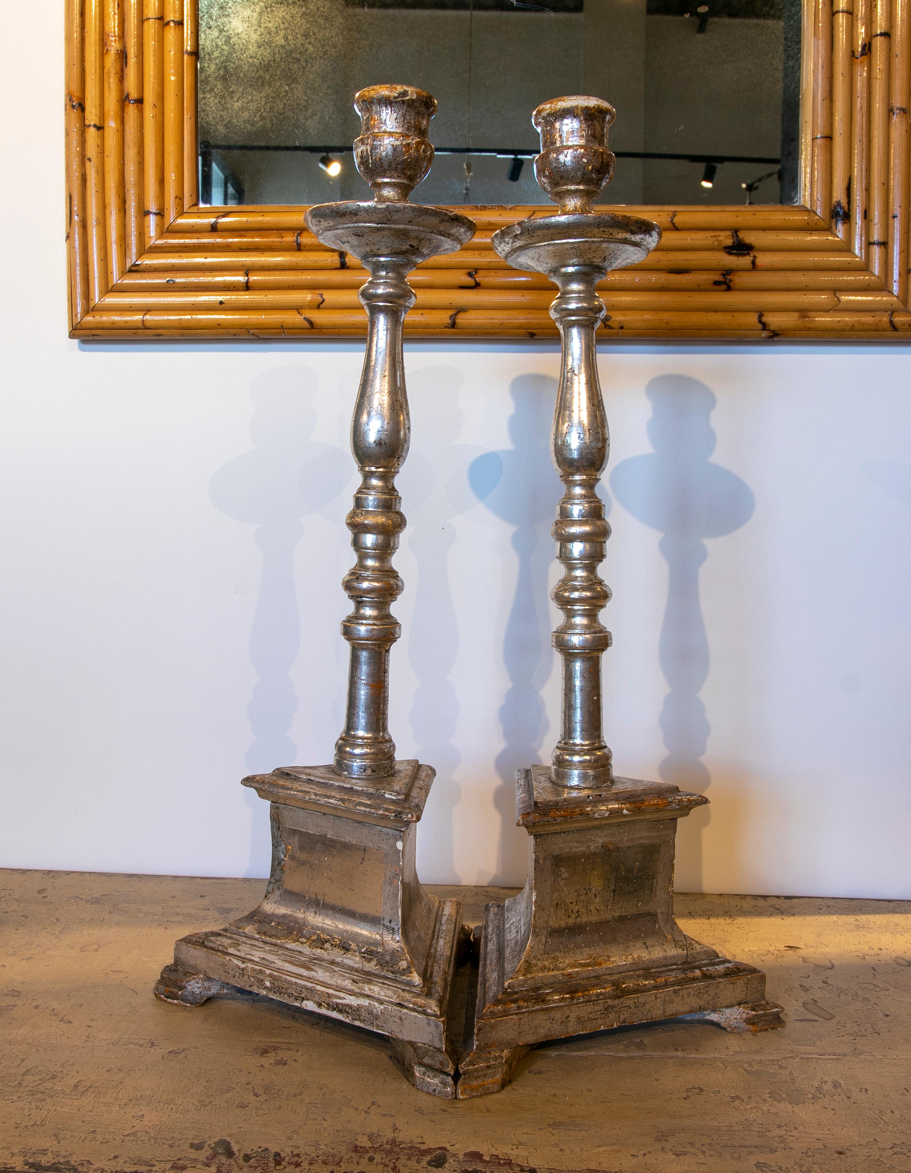 18th century Spanish pair of wooden axe holders silver plated.