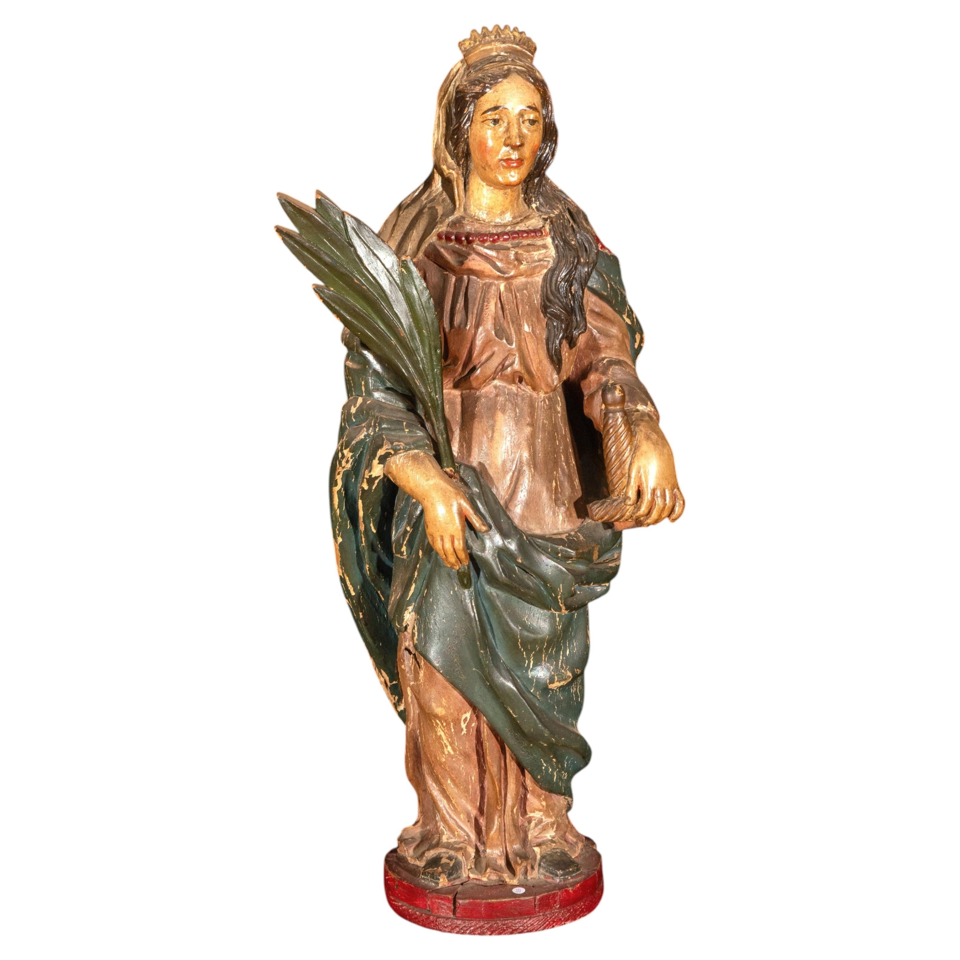 Figurine espagnole en bois polychrome du XVIIIe siècle représentant sainte Catherine