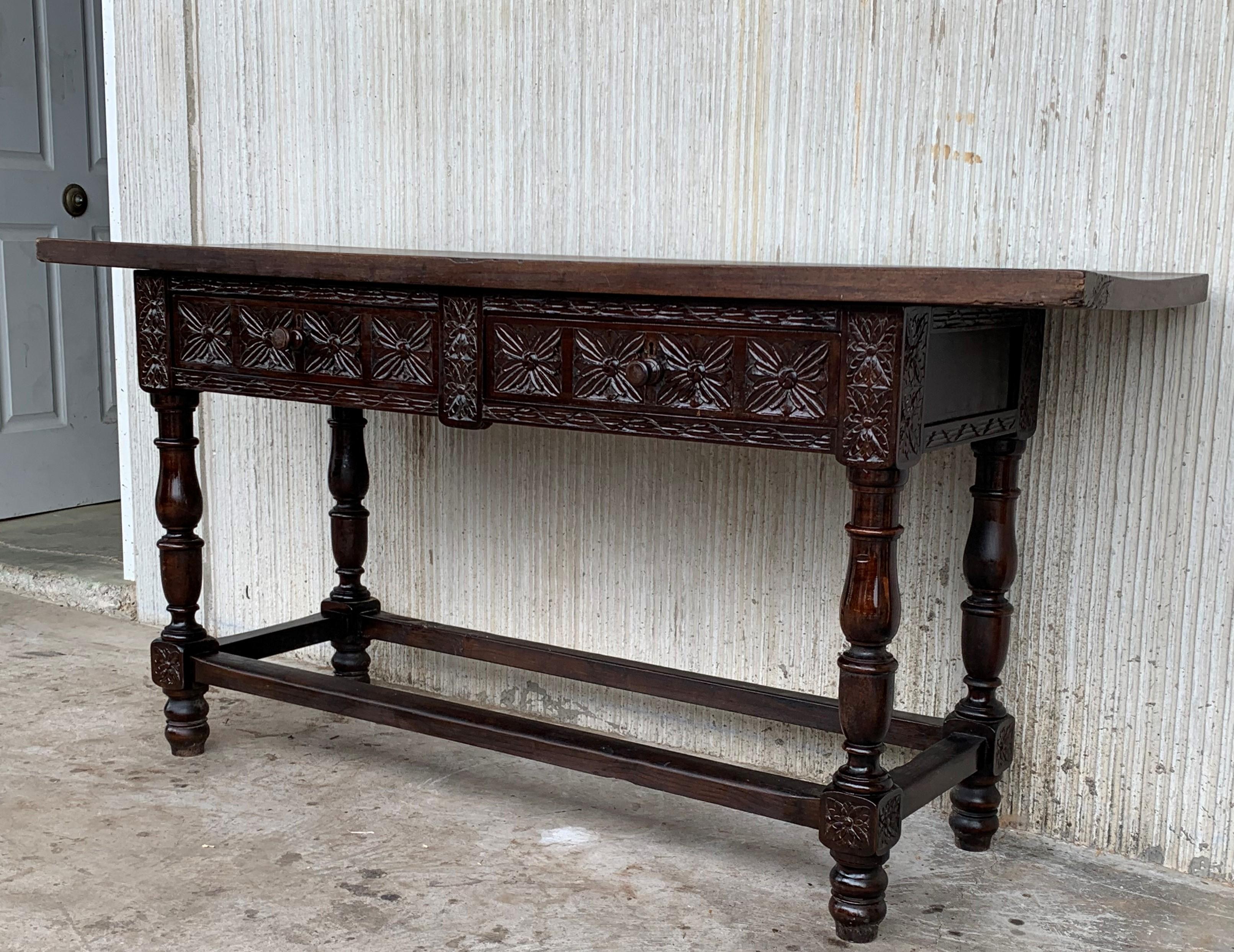 Unique piece 18th century Spanish refectory table. Beautiful console. Impressive farm table with two drawers
Carved in front and back and sides
Completely restored.

  