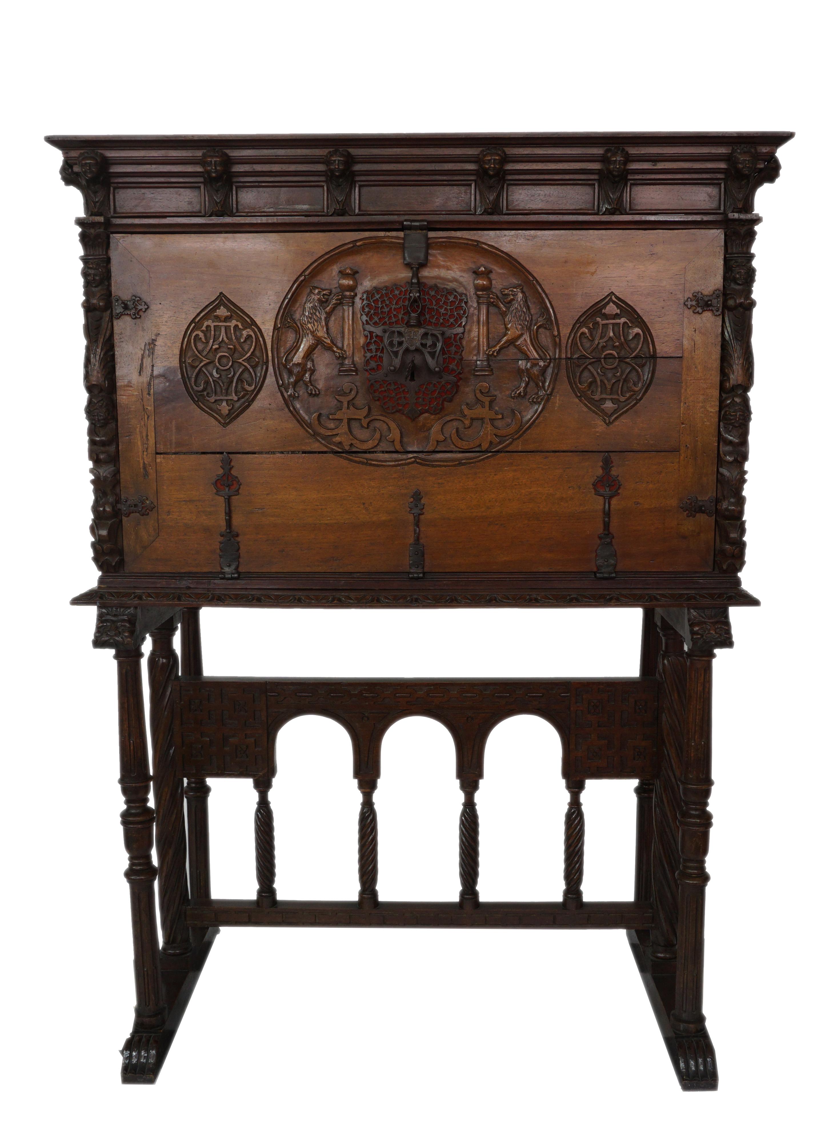 Exceptional 18th Century Renaissance Style Vargueno on stand.
The stand is in the style of a bridge the front cover depicts the columns and lions of ``non plus ultra´´
Incised ivory depicting Knightly Scenes.
