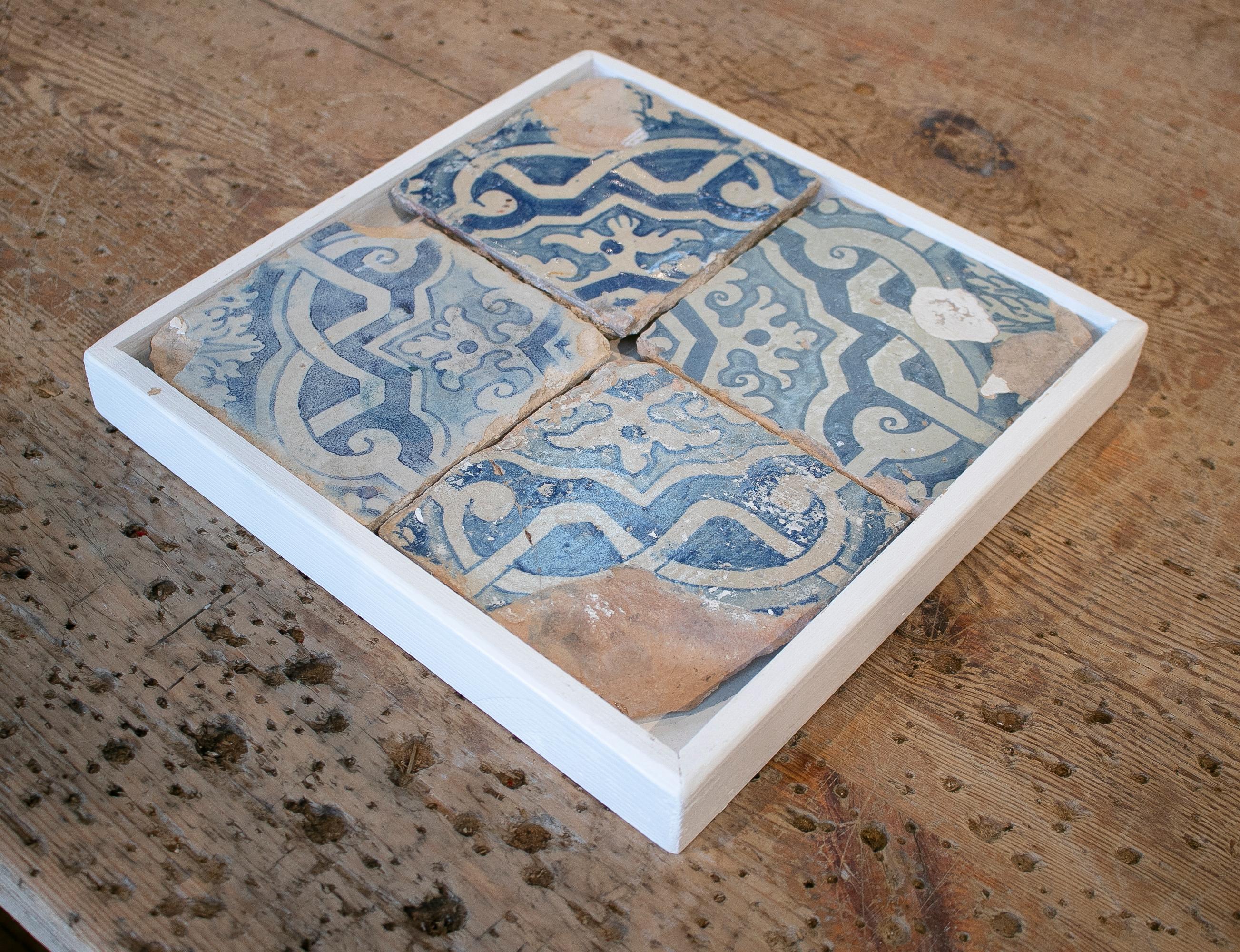 18th century Spanish set of 4 framed cobal blue glazed ceramic tiles with geometric pattern. 

Dimensions with frame: 30 x 30.