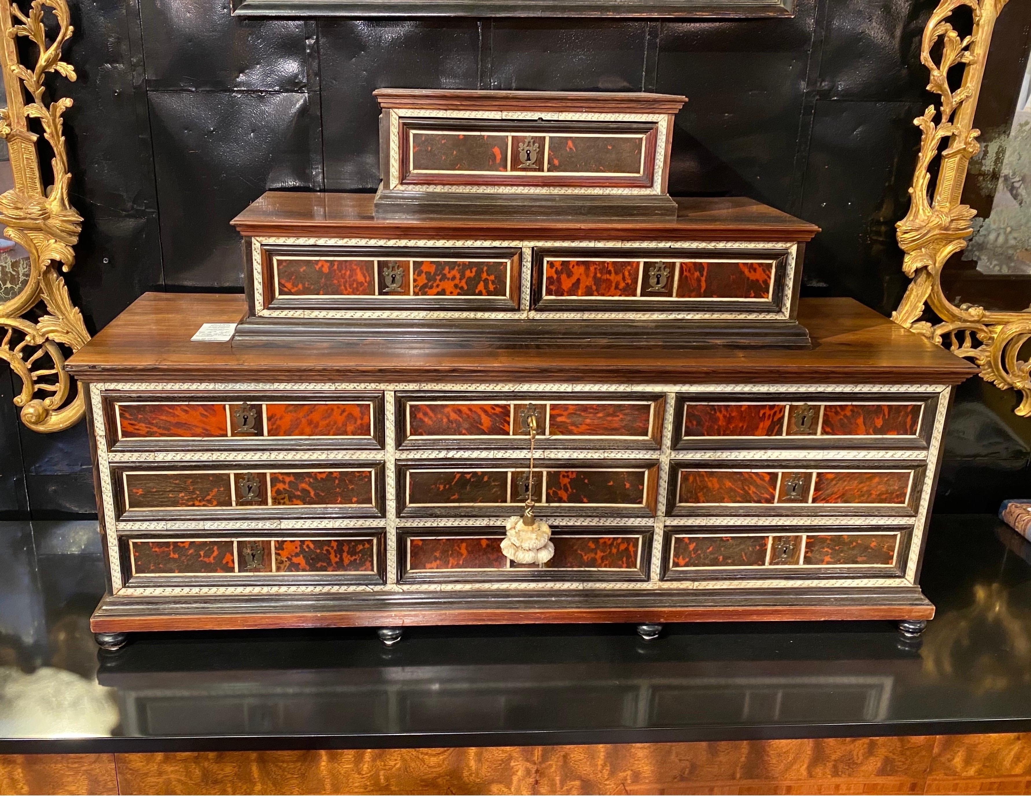 Early 18th century Spanish vargueno from the McNair family collection. Very good quality and detail, this collectors cabinet is made of rosewood, tortoise shell, and bone and was photographed in the McNair’s Dallas home and published in