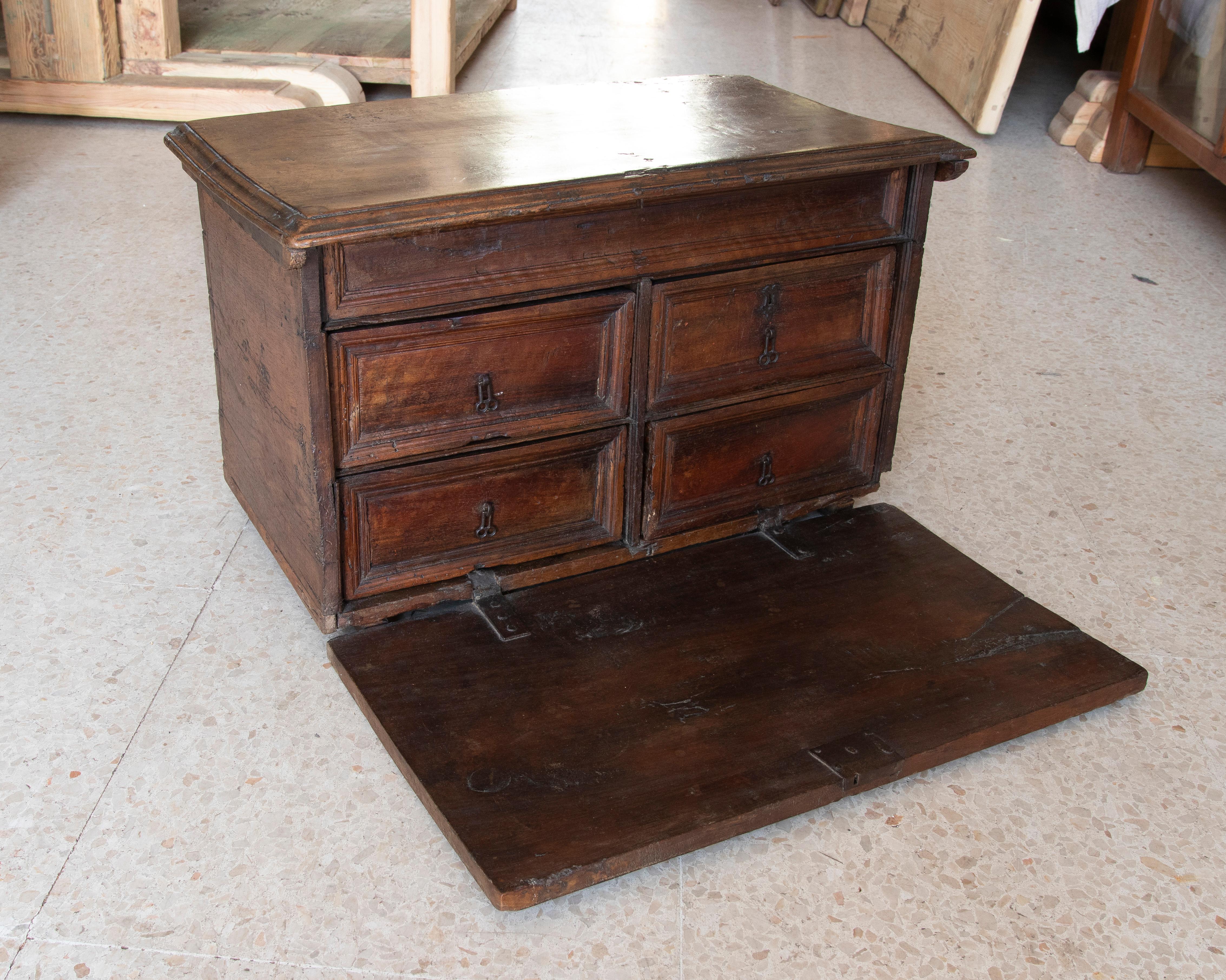 18th Century Spanish walnut writing desk with door and drawers in the Interior.