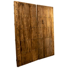 18th Century Spanish Wooden Door with Bronze Nail Decoration