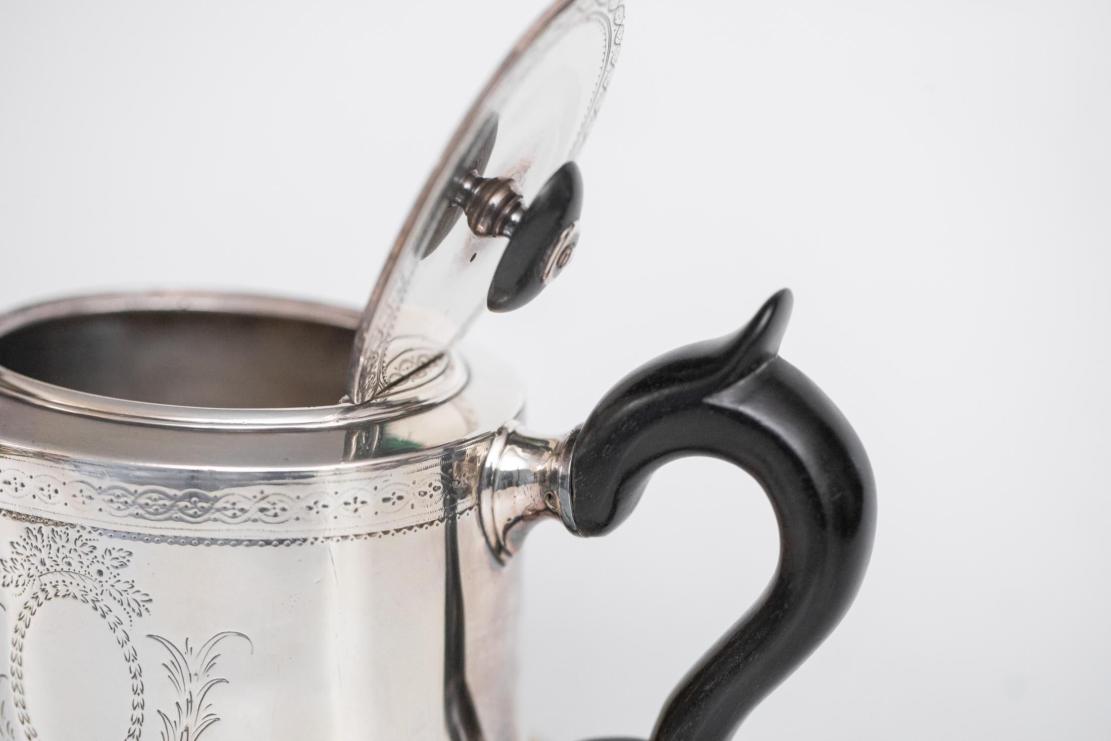 
This elegant teapot with matching stand dates from 1779 and was made in London by the renowned silversmiths Charles Aldridge and Henry Green, whose works are listed under Grimwade no. 265. The teapot is made from the finest 925 sterling silver and