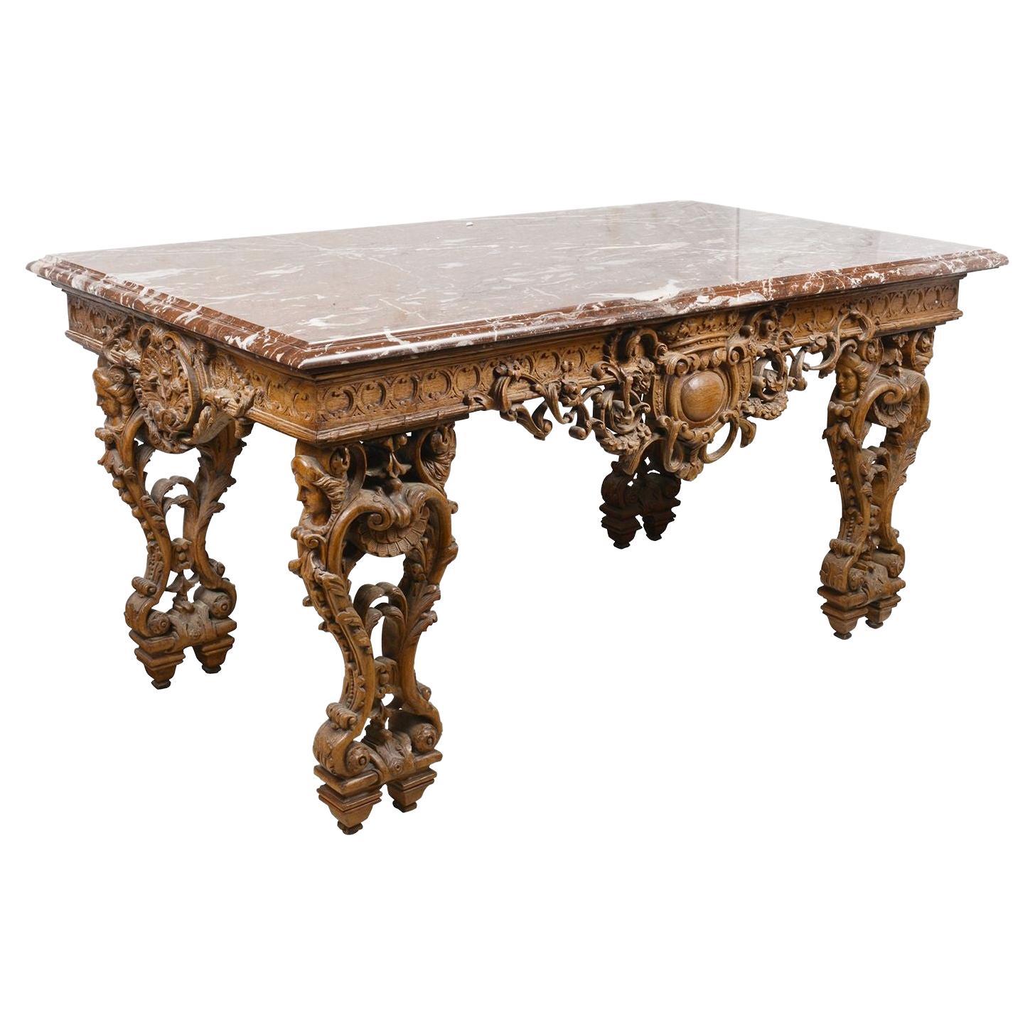 Table centrale/table console en chêne sculpté de style du XVIIIe siècle.