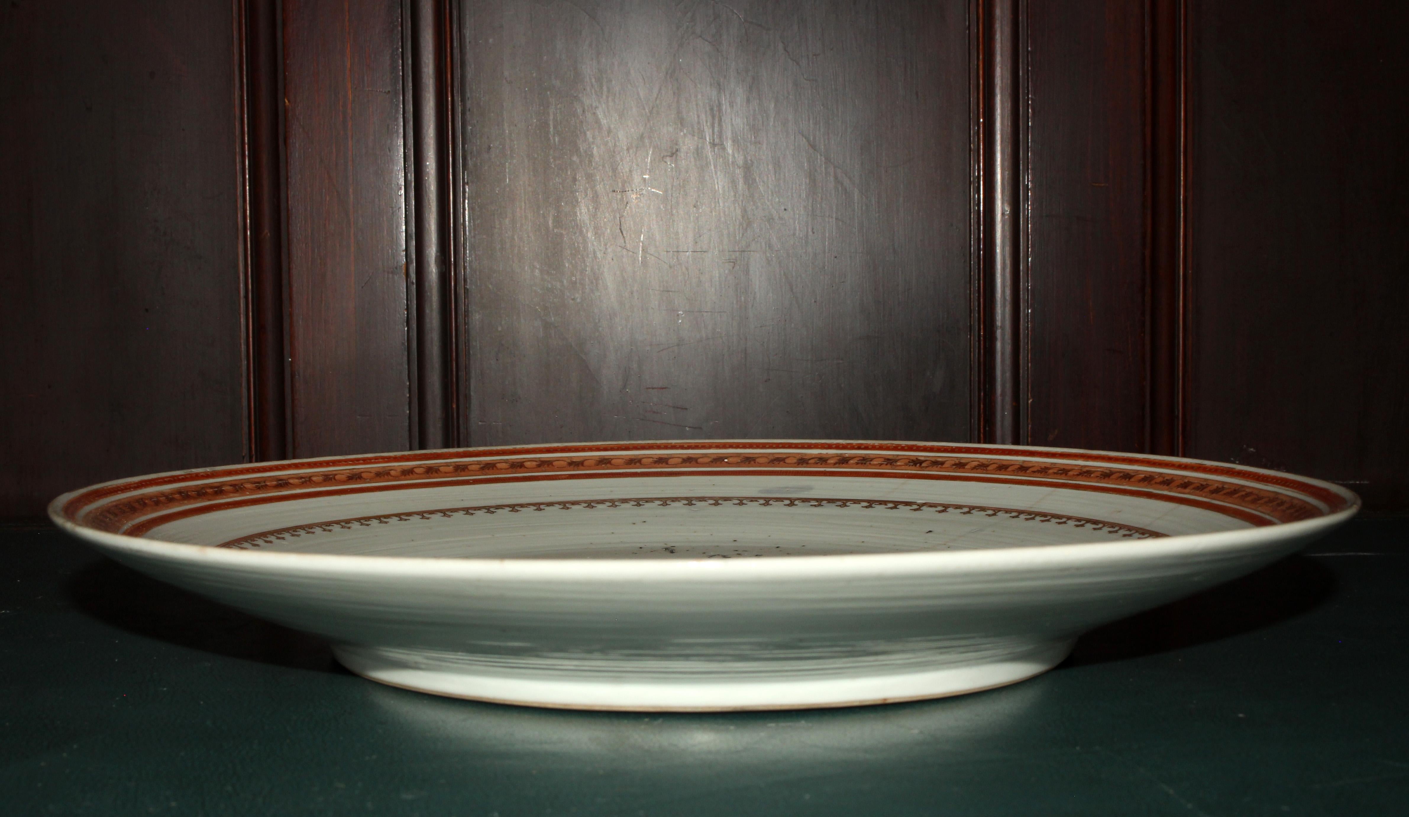 An 18th century style Chinese Export Armorial Chop Plate. With multiple hairlines. Dramatic design. Possibly Samson. Early 20th century. 13